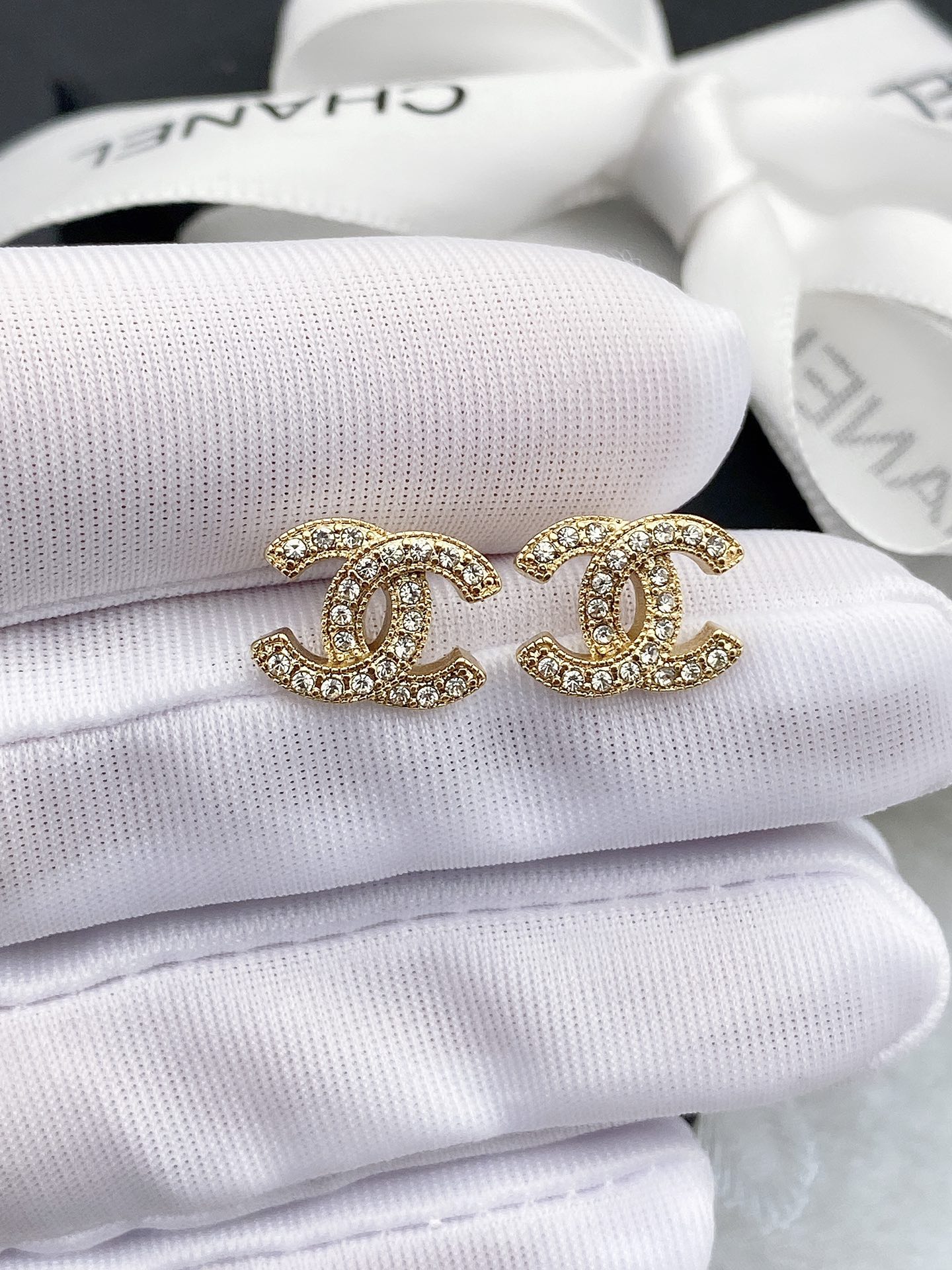 Chanel CC Crystal Stud Earrings earrings silver-tone metal with clear crystals gold-tone metal with clear crystals 1cm diameter