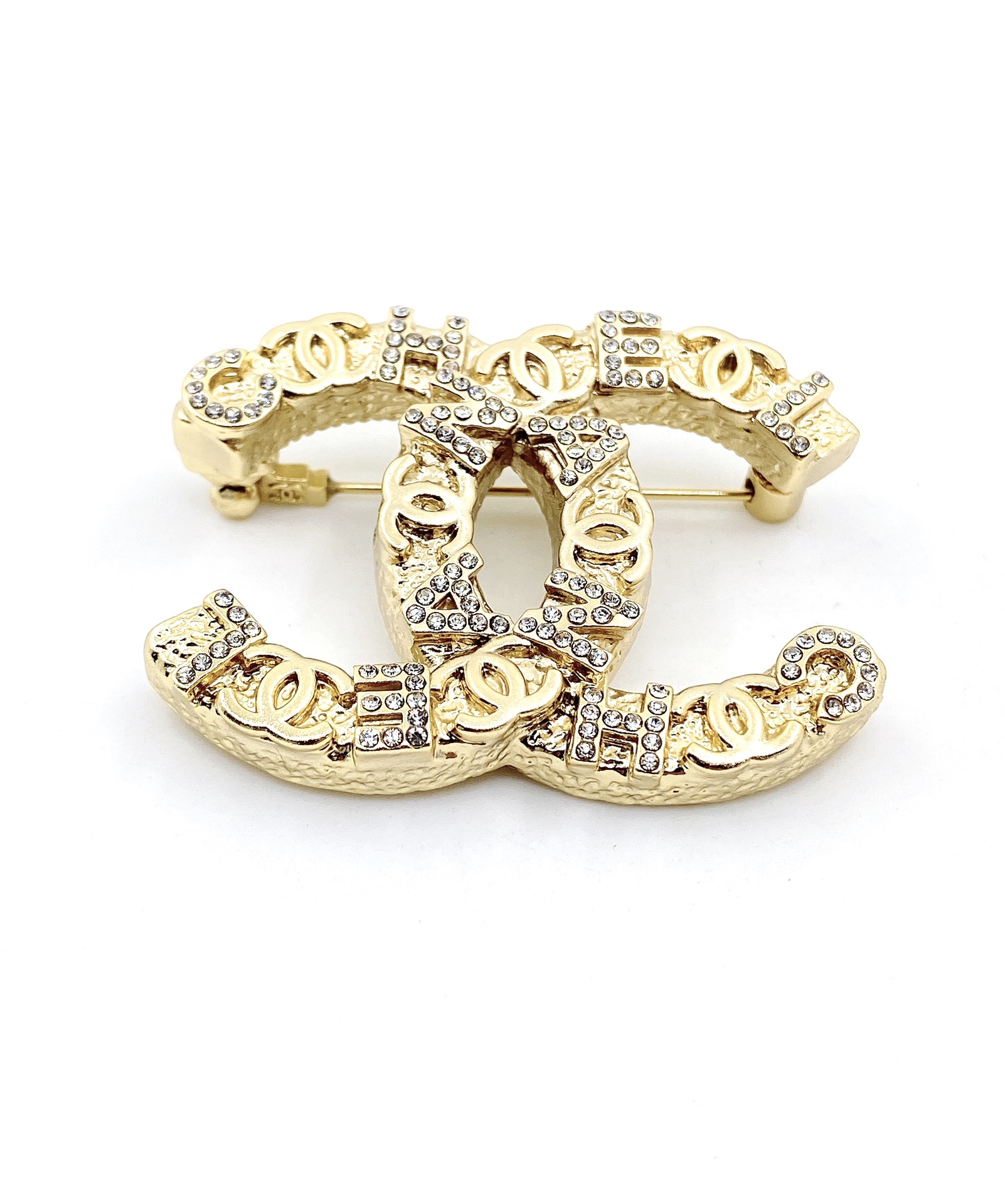 Chanel CC Logo Crystal Letter Brooch brooch gold tone metal with clear crystal rhinestones 4 5cm width