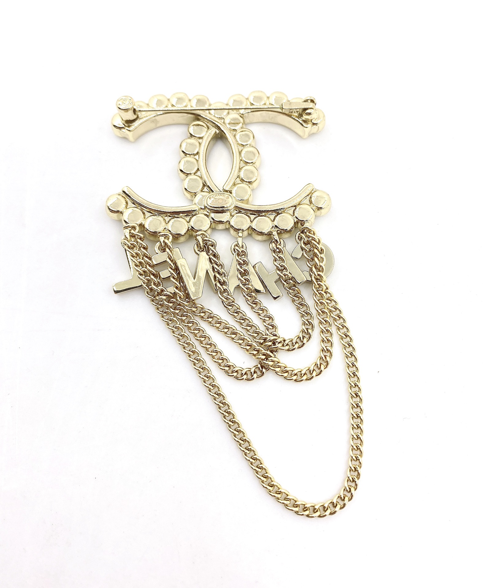 Chanel CC Logo Letter Chain Fringe Brooch brooch Gold-tone metal with clear faceted crystal accents Approximately 6cm width 9cm total drop length with chains