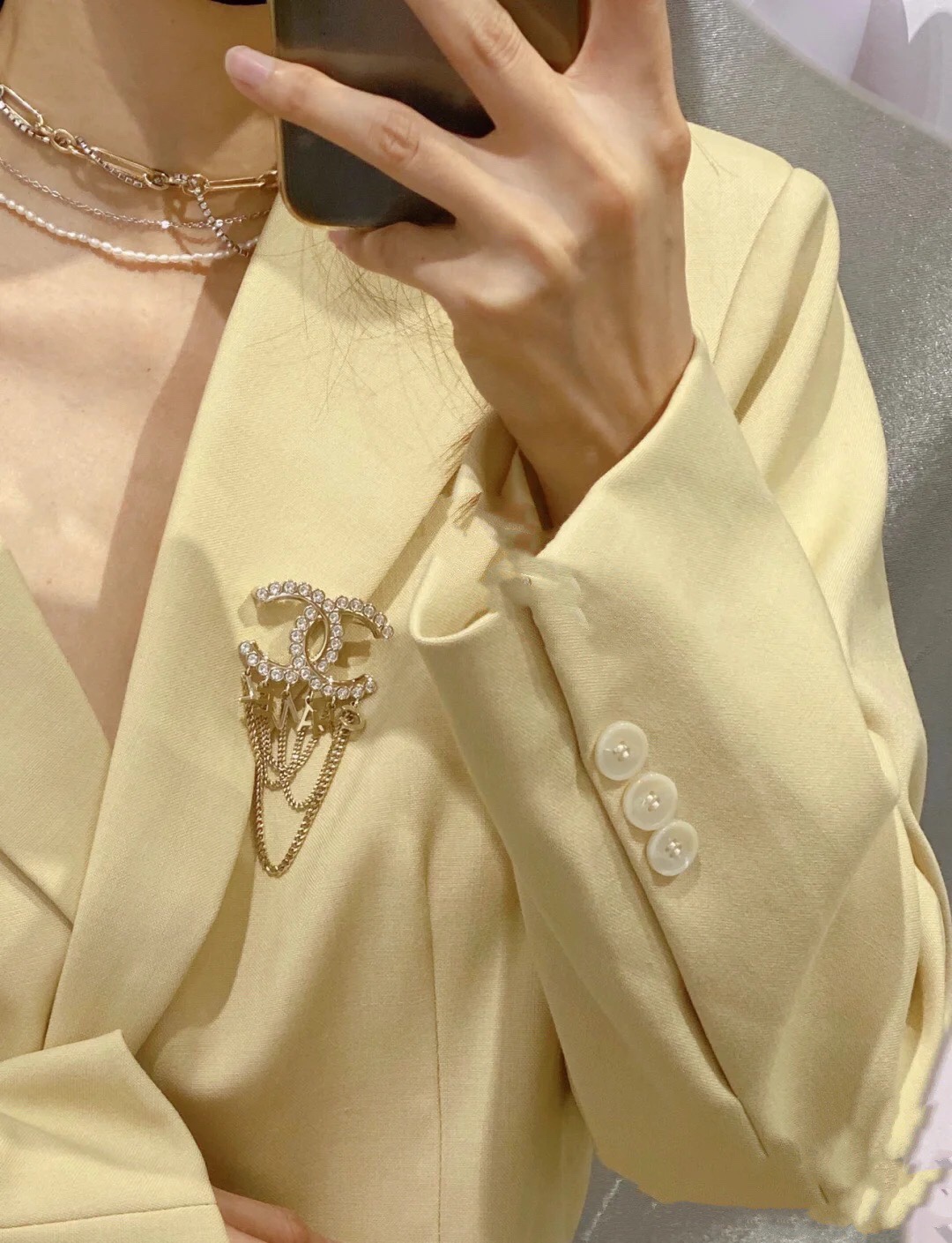 Chanel CC Logo Letter Chain Fringe Brooch brooch Gold-tone metal with clear faceted crystal accents Approximately 6cm width 9cm total drop length with chains