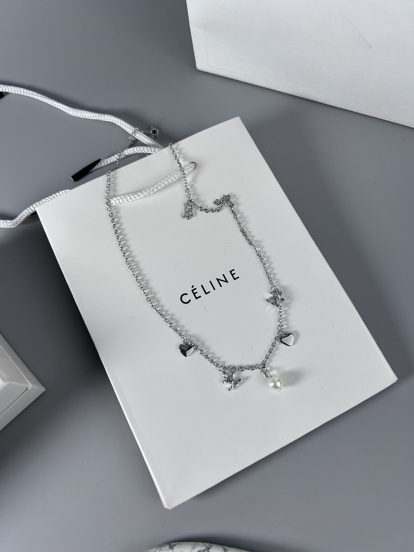 Celine Triomphe Heart Pearl Charm Necklace necklace silver-toned metal with white pearl accents 40cm