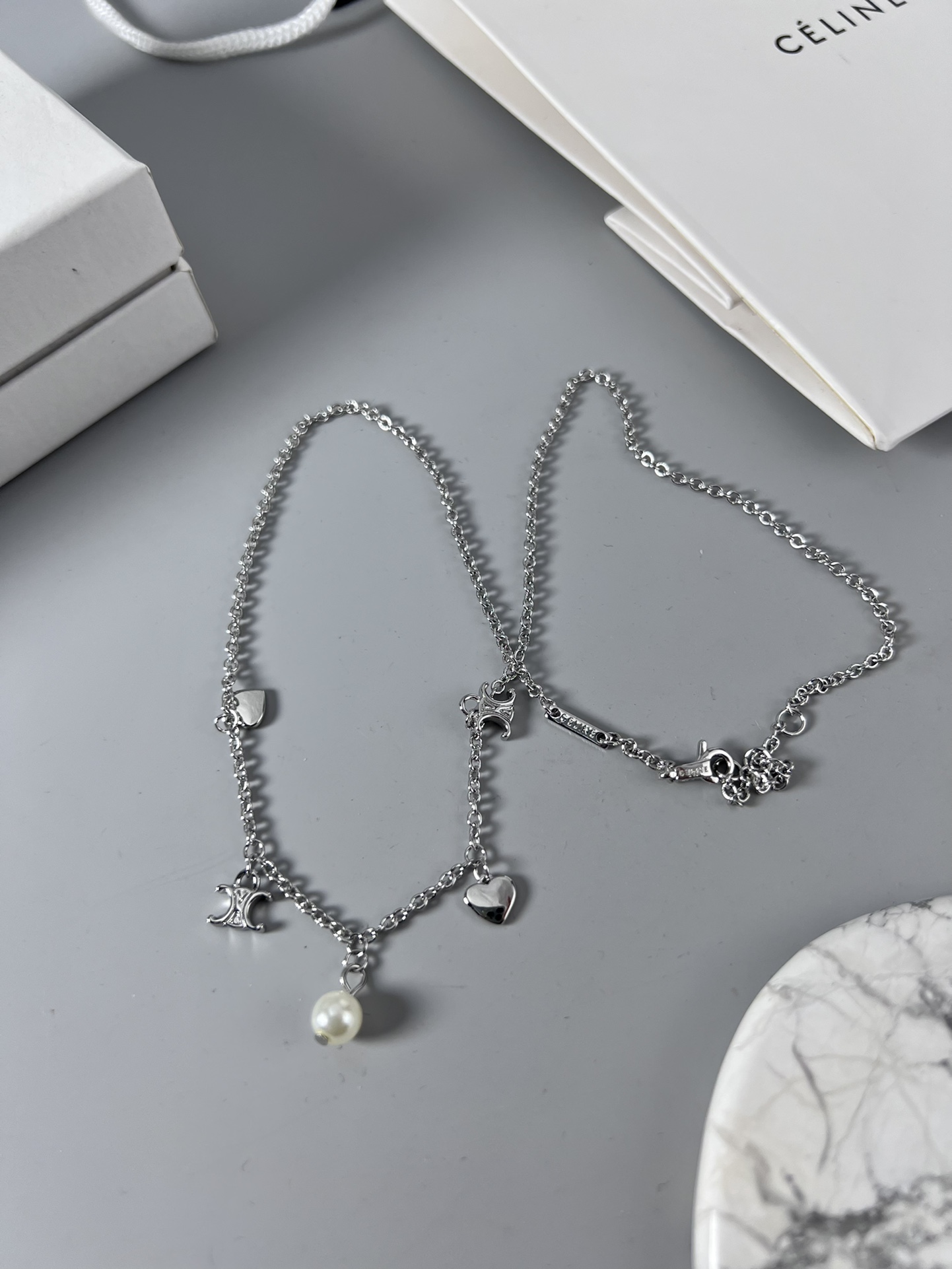 Celine Triomphe Heart Pearl Charm Necklace necklace silver-toned metal with white pearl accents 40cm