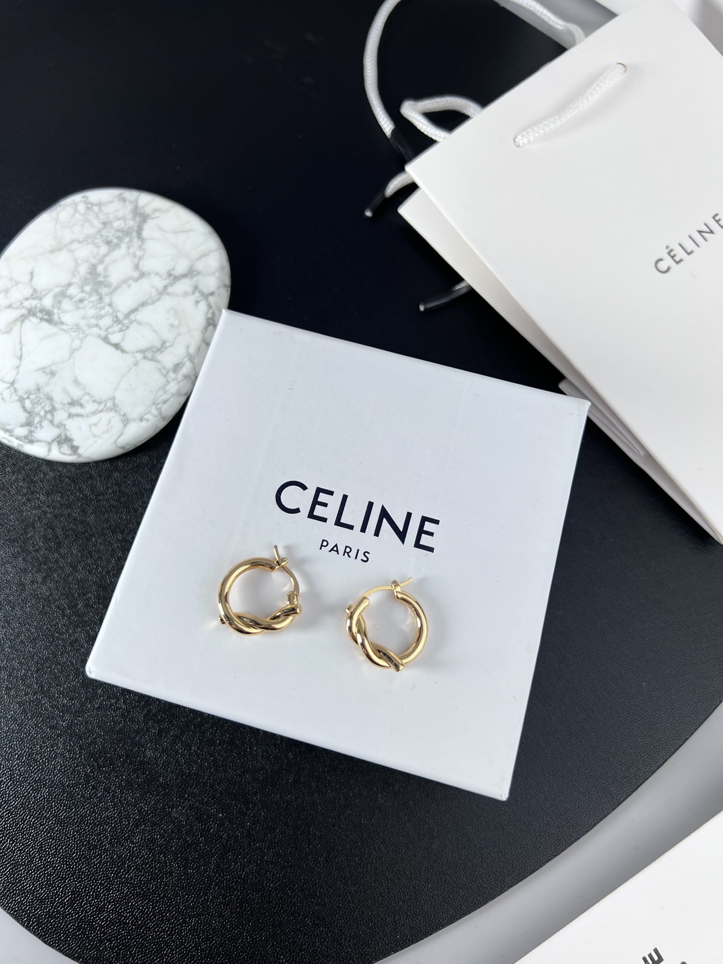 Celine YHED045 Twist Hoop earrings Gold-tone metal first variant Silver-tone metal second and third variants no gemstones 2cm diameter