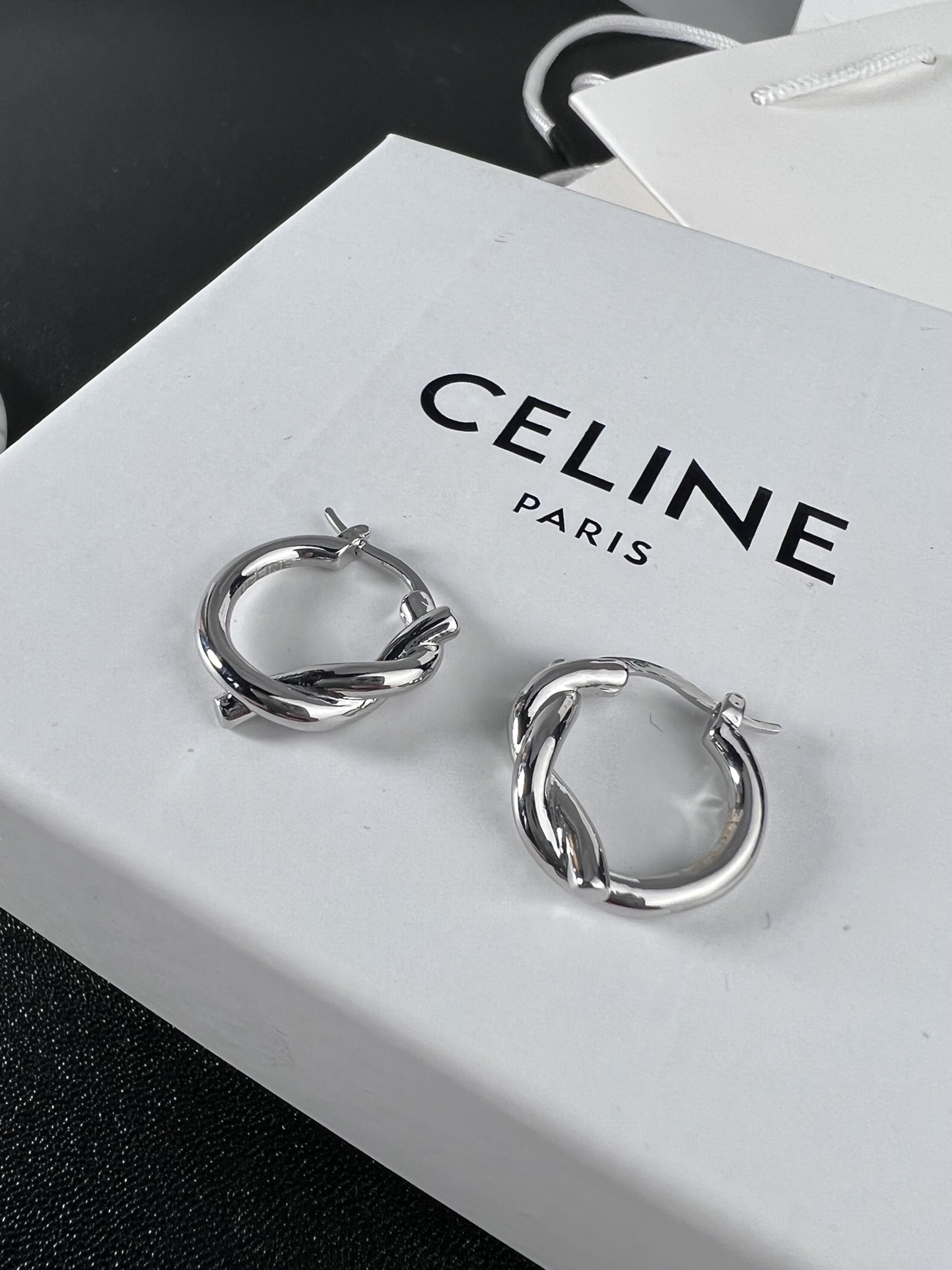 Celine YHED045 Twist Hoop earrings Gold-tone metal first variant Silver-tone metal second and third variants no gemstones 2cm diameter