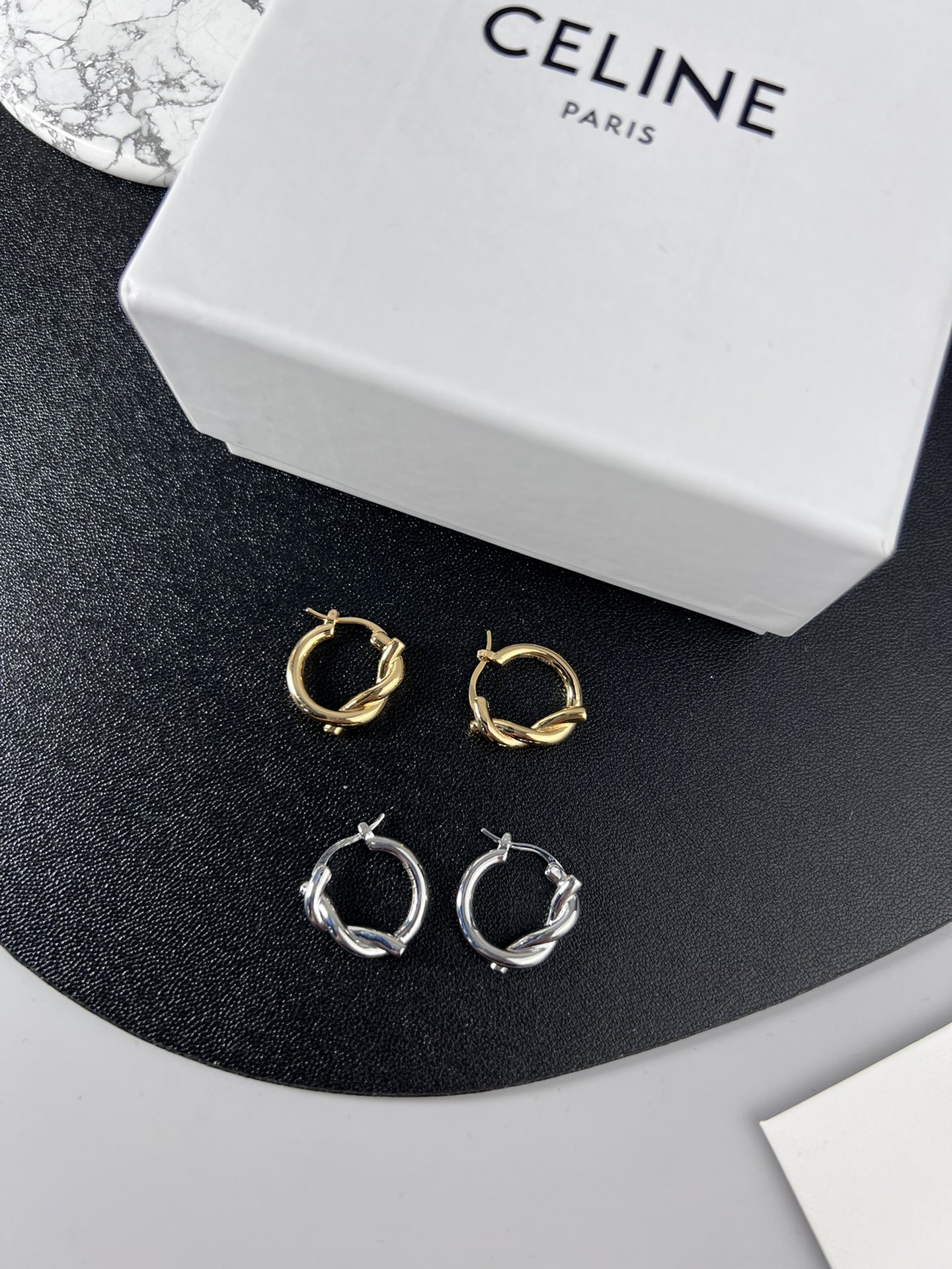 Celine YHED045 Twist Hoop earrings Gold-tone metal first variant Silver-tone metal second and third variants no gemstones 2cm diameter