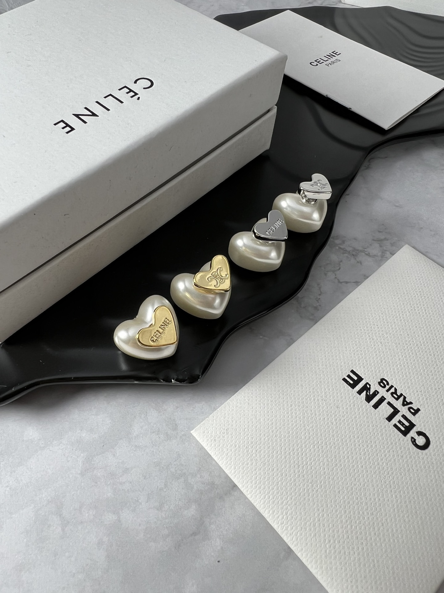 Celine Triomphe Heart Pearl Stud Earrings earrings silver-toned metal with cream white faux pearl 1 5cm stud diameter