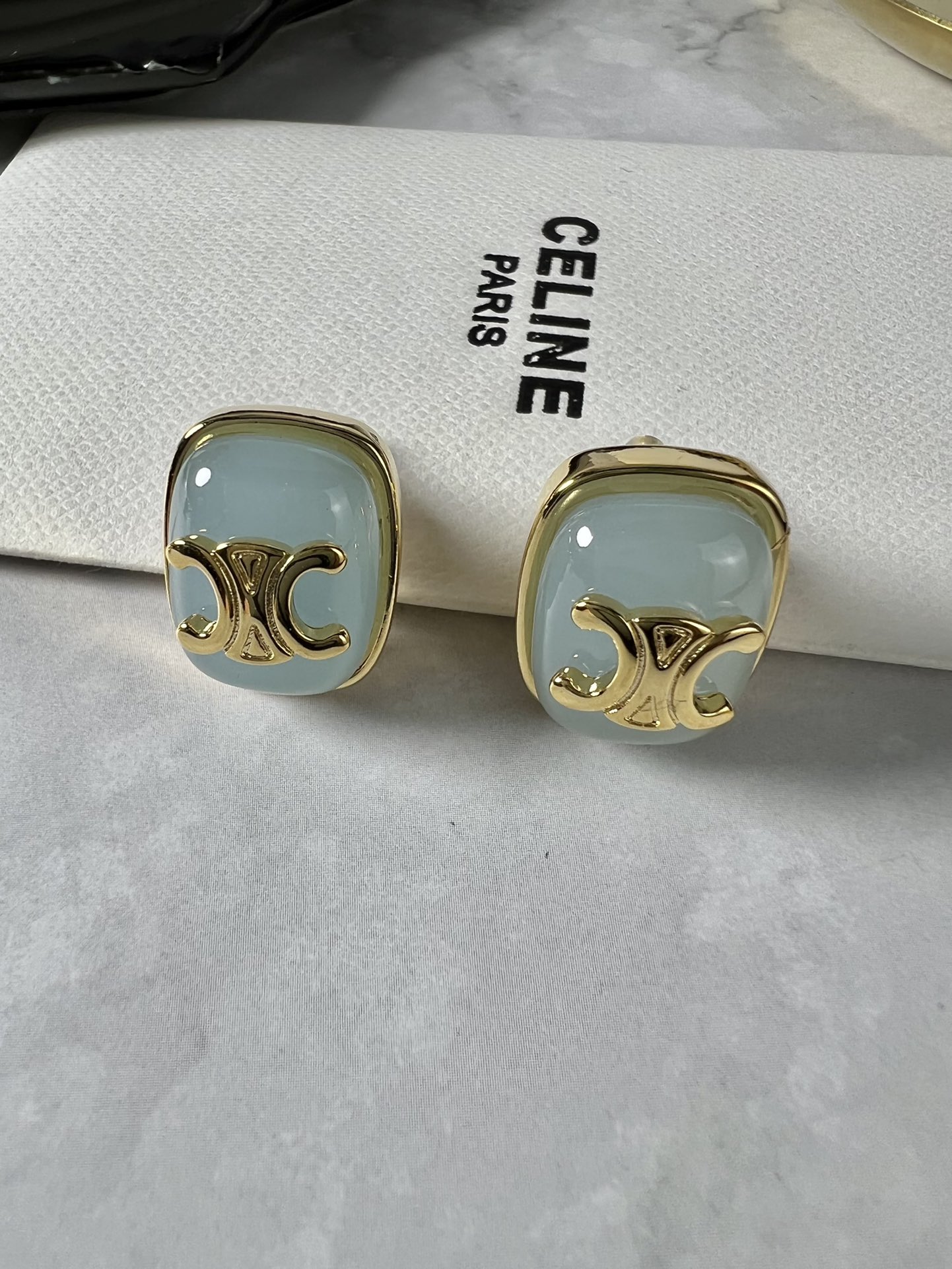 Celine Triomphe Resin Square Stud Earrings earrings gold-tone metal with black pink and light blue resin accents 2cm stud diameter