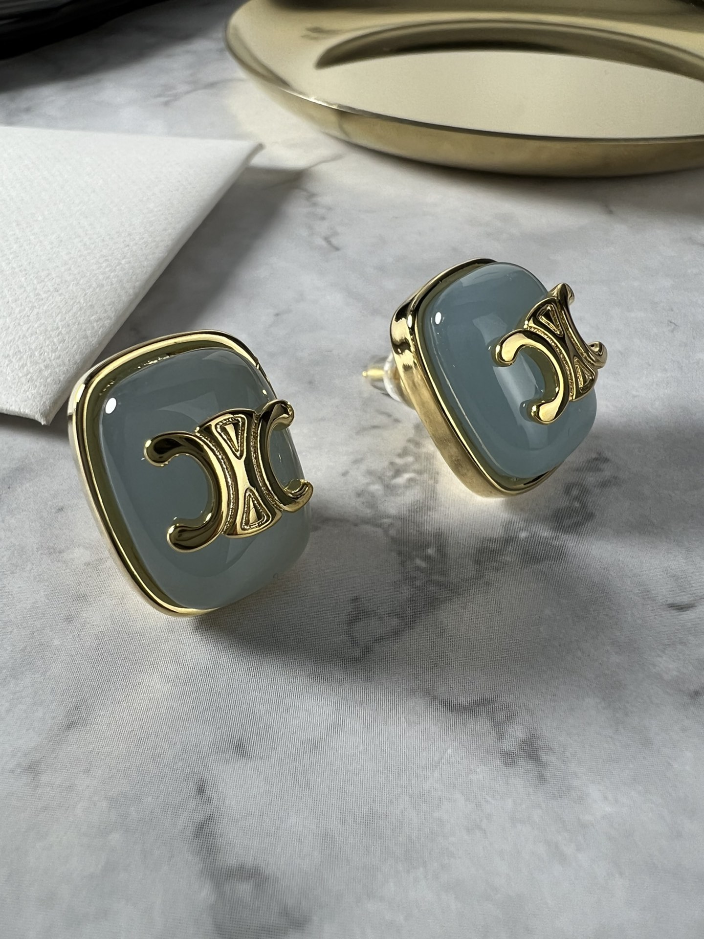 Celine Triomphe Resin Square Stud Earrings earrings gold-tone metal with black pink and light blue resin accents 2cm stud diameter