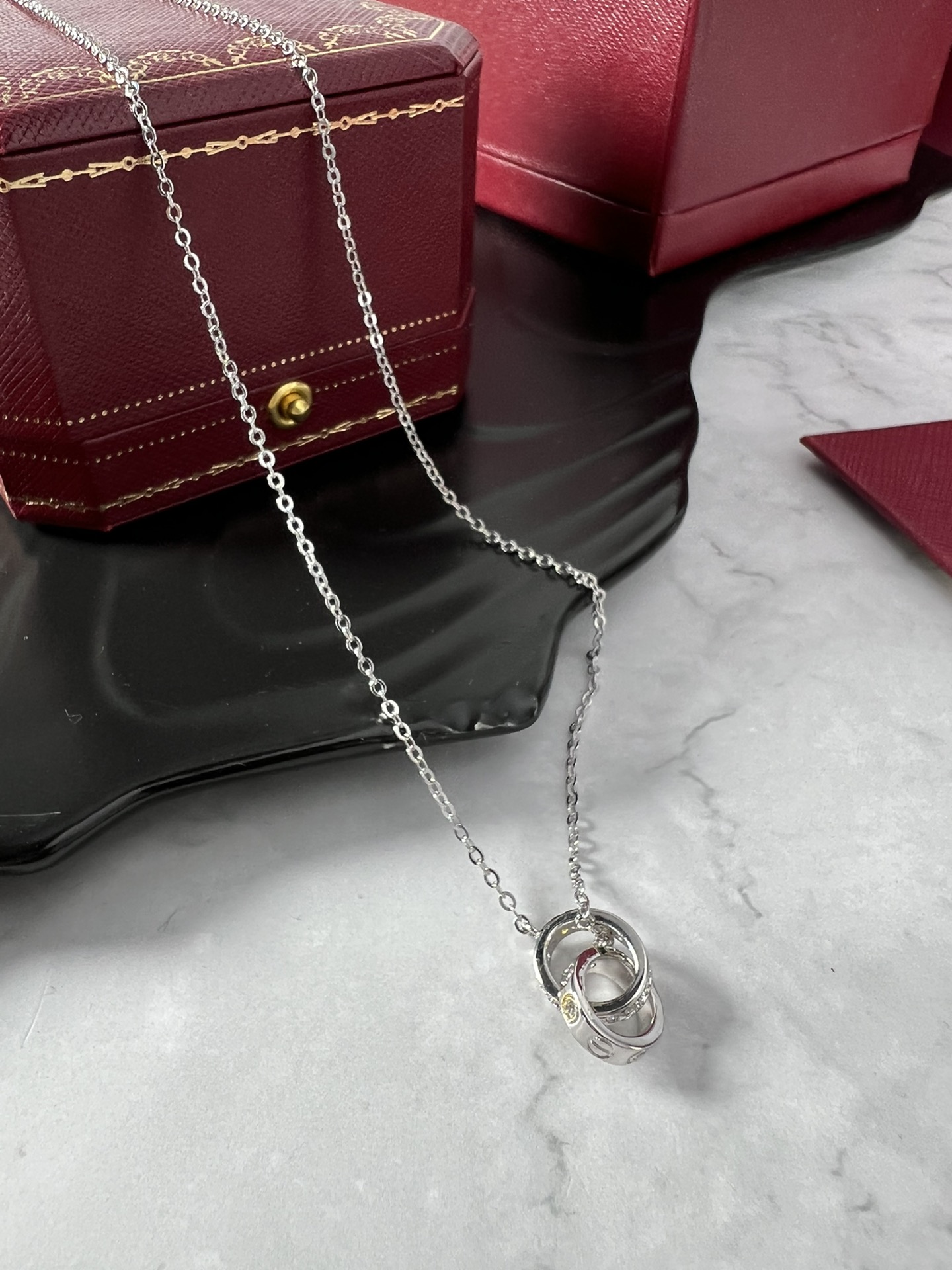 Cartier Love necklace silver-toned white gold with clear diamonds and yellow gold accent stones 42cm
