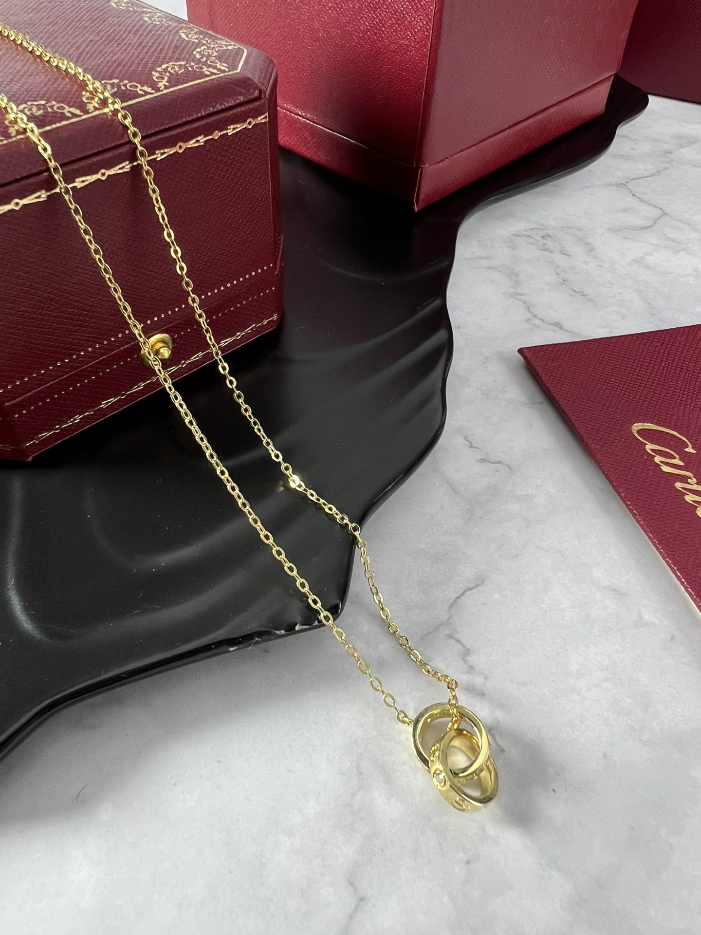 Cartier Love necklace silver-toned white gold with clear diamonds and yellow gold accent stones 42cm