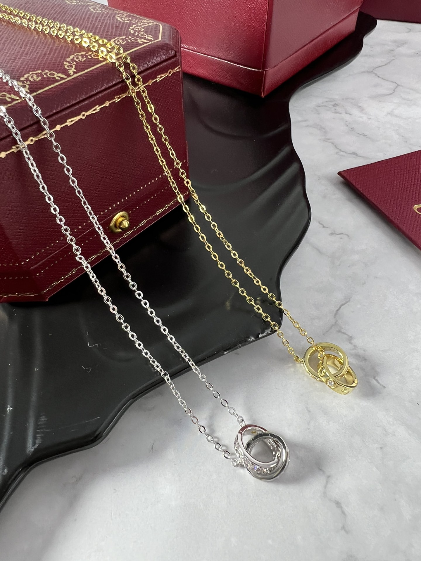 Cartier Love necklace silver-toned white gold with clear diamonds and yellow gold accent stones 42cm