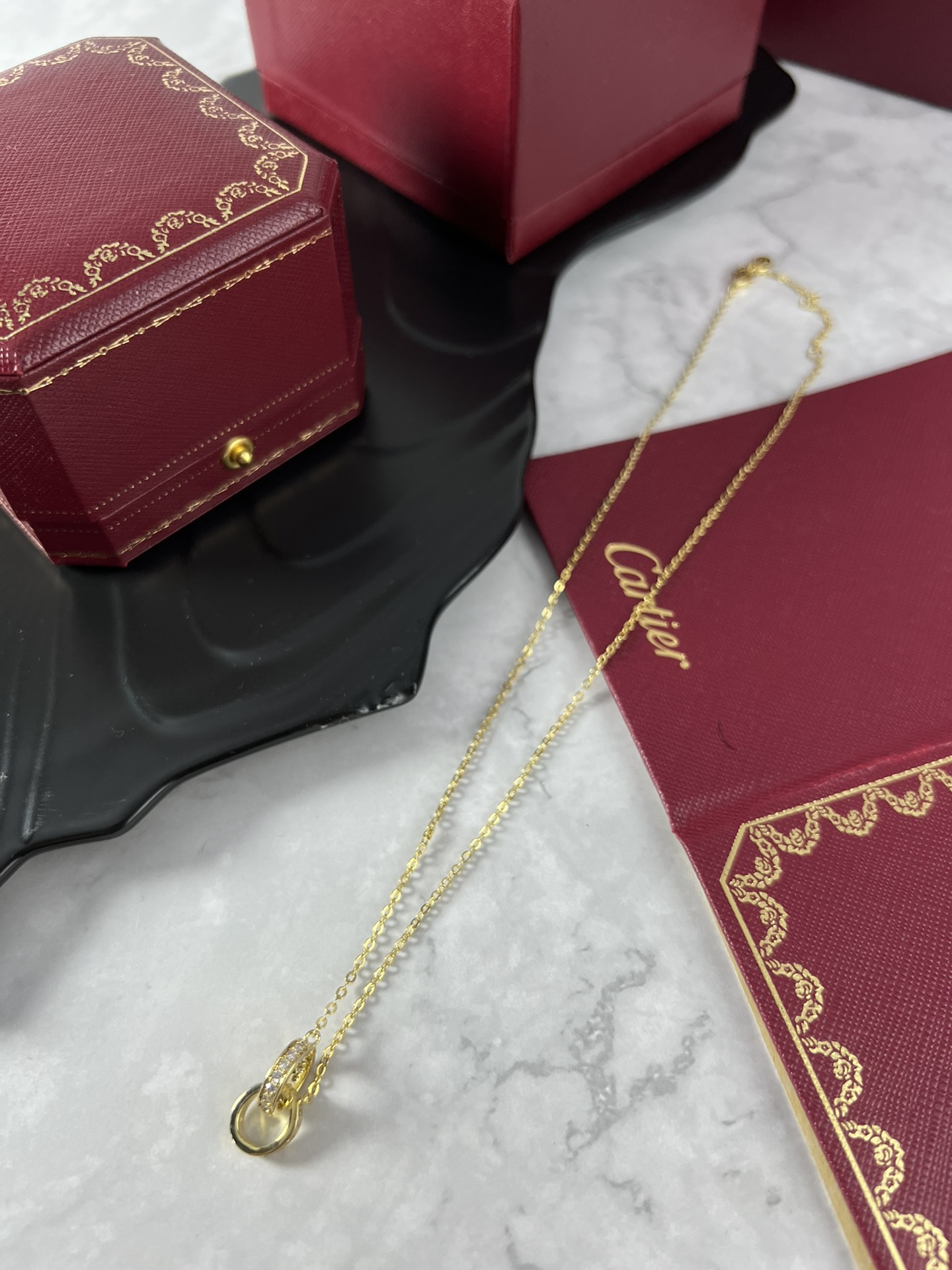Cartier Love necklace silver-toned white gold with clear diamonds and yellow gold accent stones 42cm