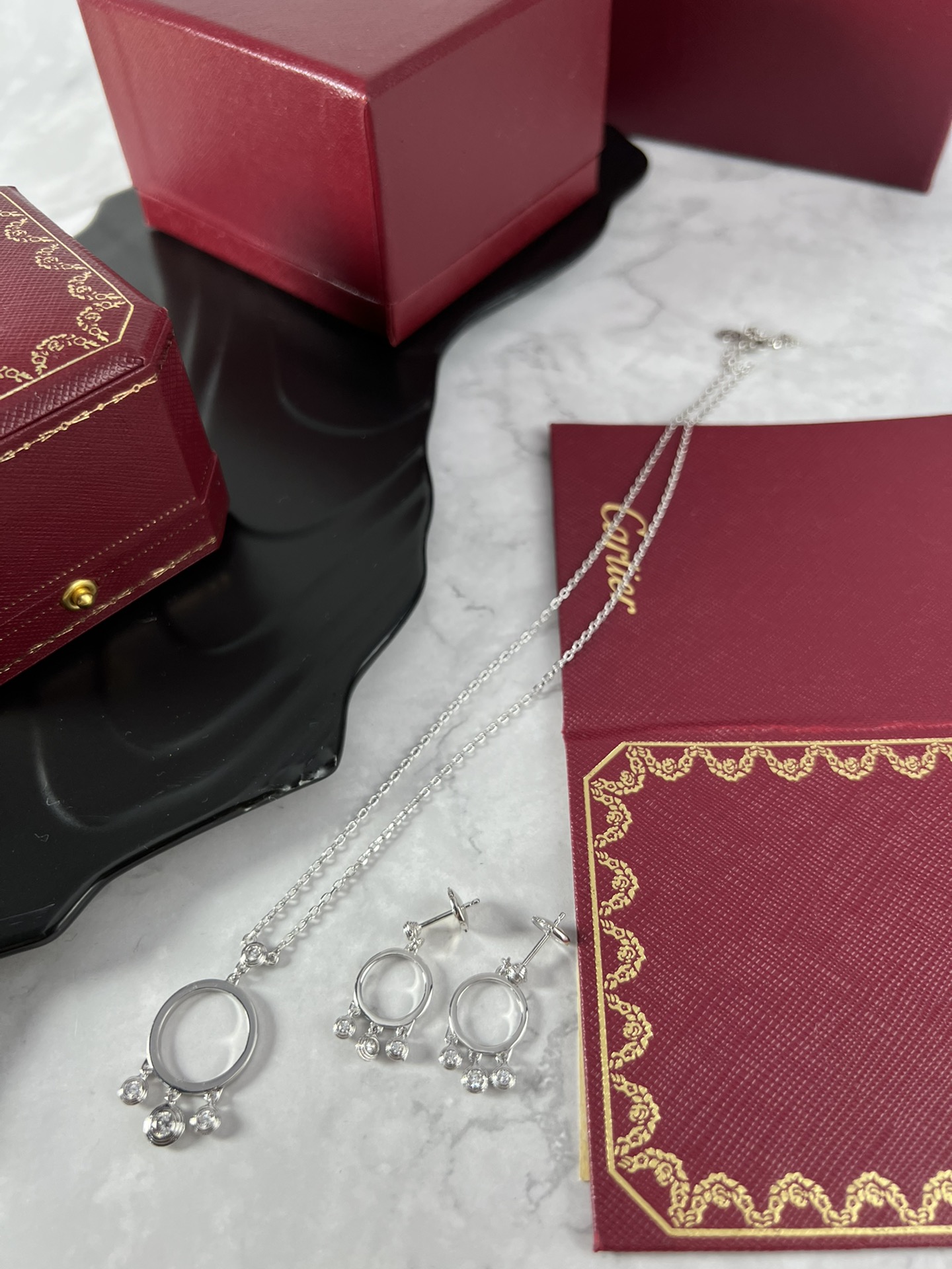 Cartier Agrafe earrings silver-toned white gold with clear diamonds one size