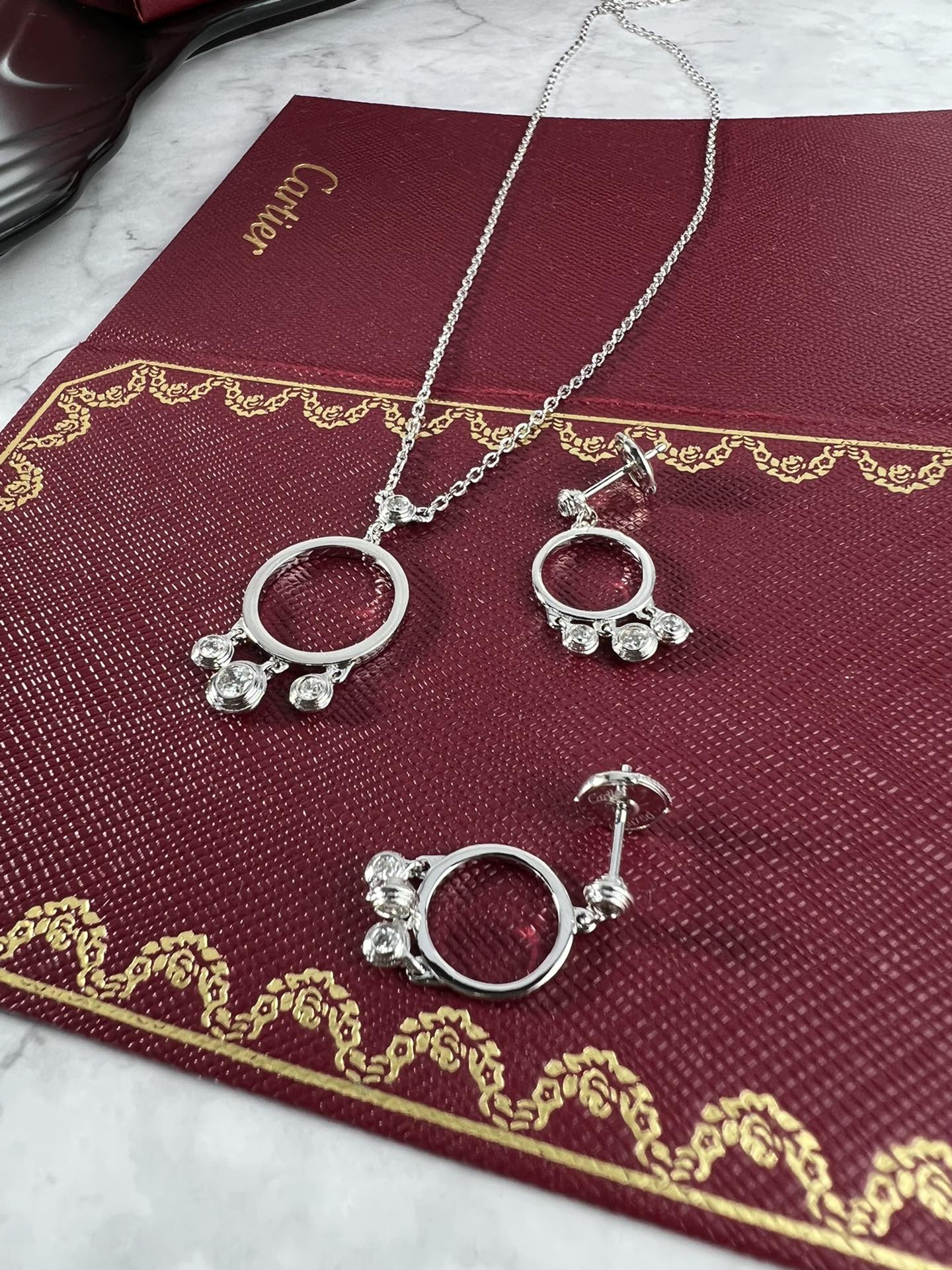 Cartier Agrafe earrings silver-toned white gold with clear diamonds one size