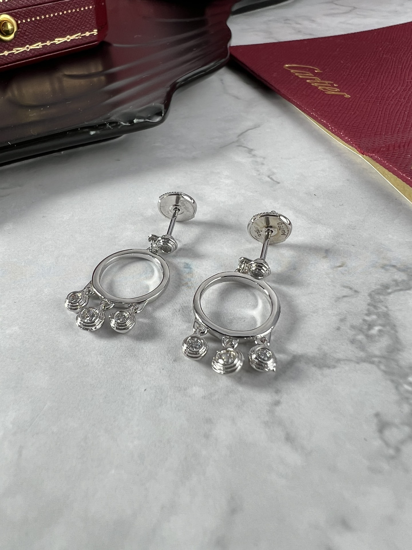Cartier Agrafe earrings silver-toned white gold with clear diamonds one size