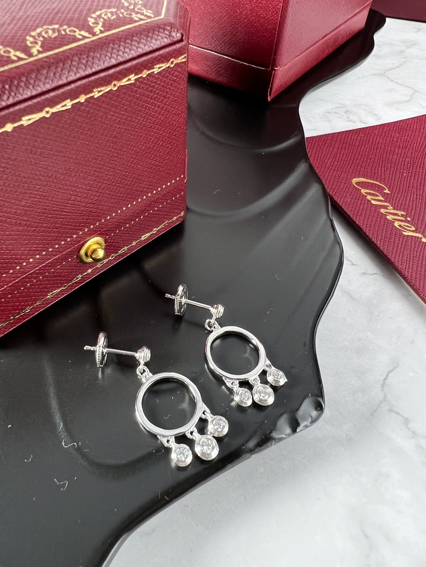 Cartier Agrafe earrings silver-toned white gold with clear diamonds one size