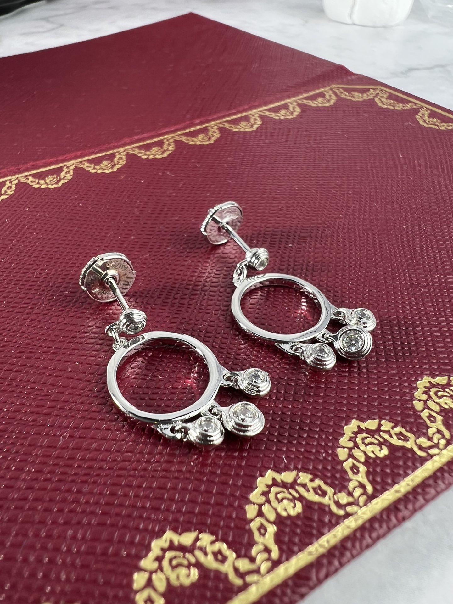 Cartier Agrafe earrings silver-toned white gold with clear diamonds one size