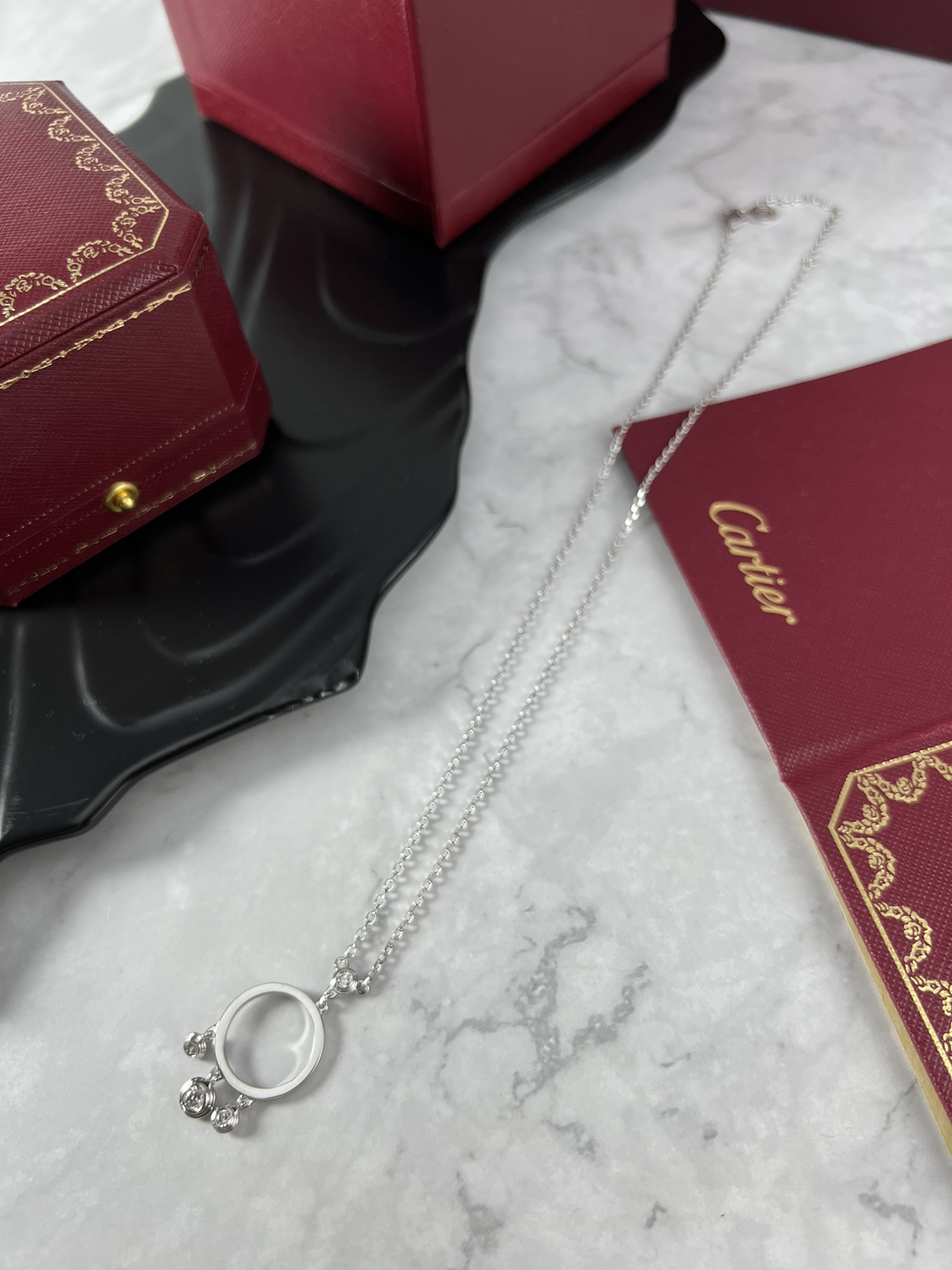 Cartier Agrafe earrings silver-toned white gold with clear diamonds one size