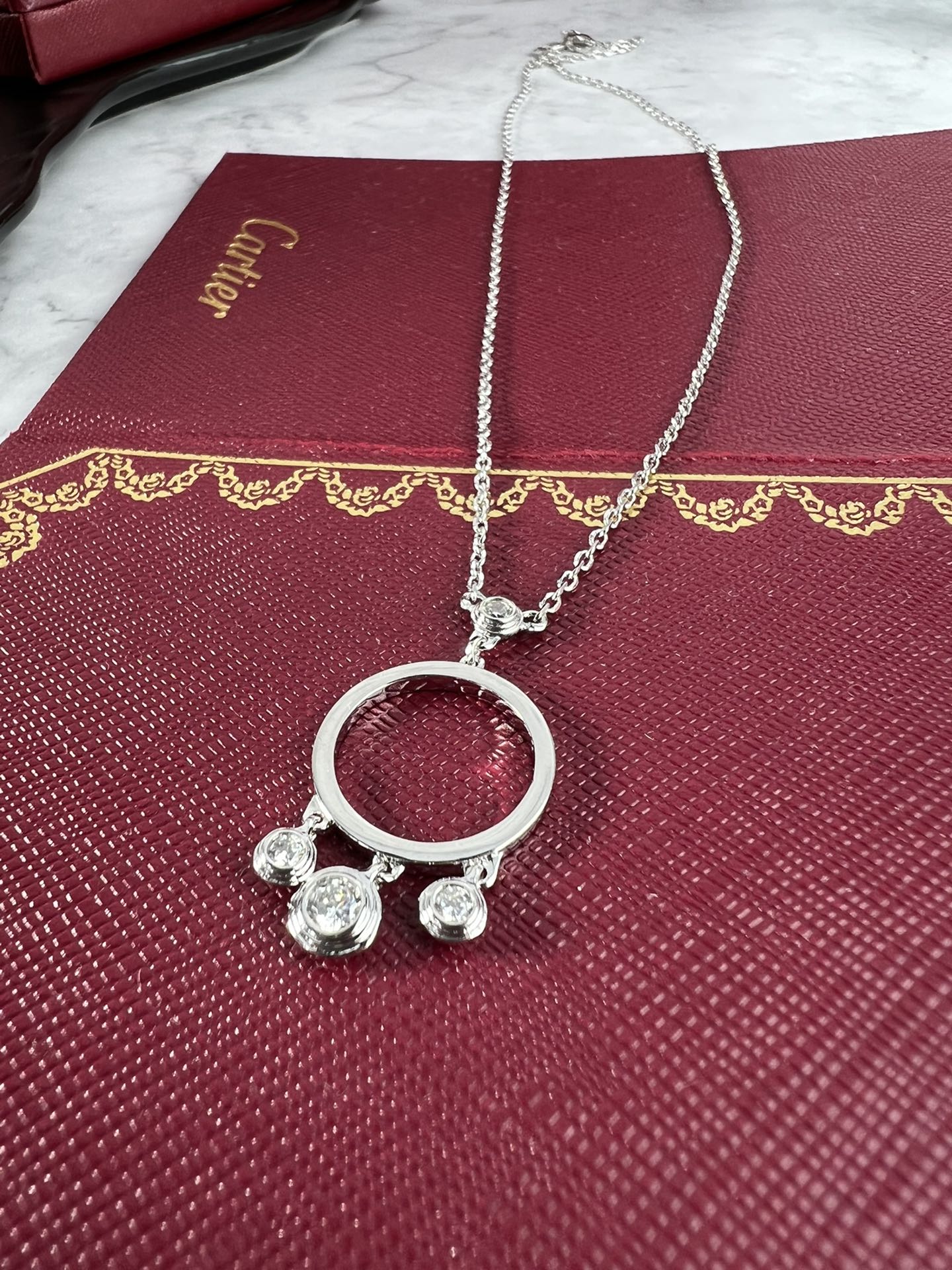 Cartier Agrafe earrings silver-toned white gold with clear diamonds one size