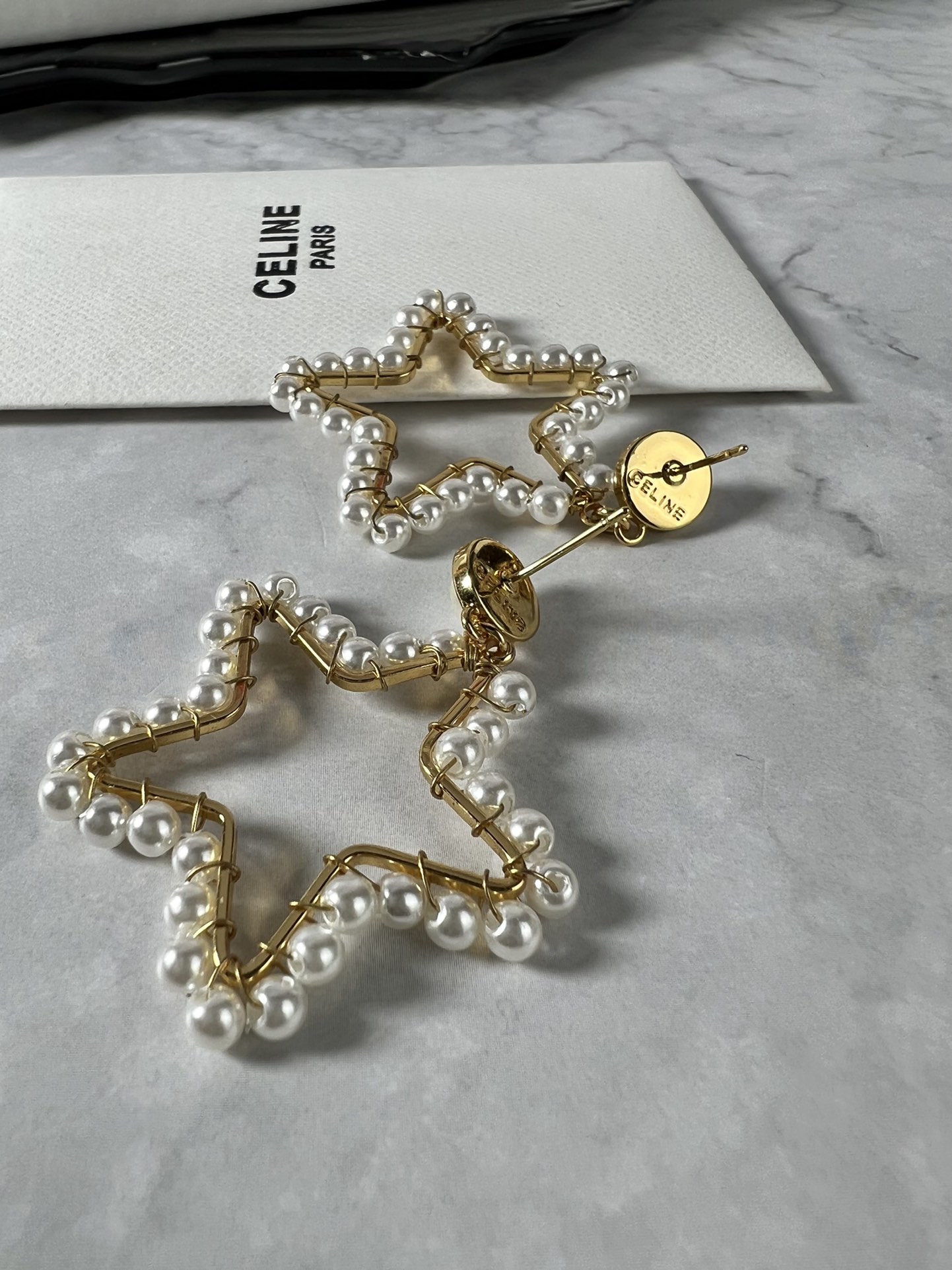 Celine Pearl Open Star Drop Earrings earrings gold-tone metal with white faux pearls 4 5cm drop length