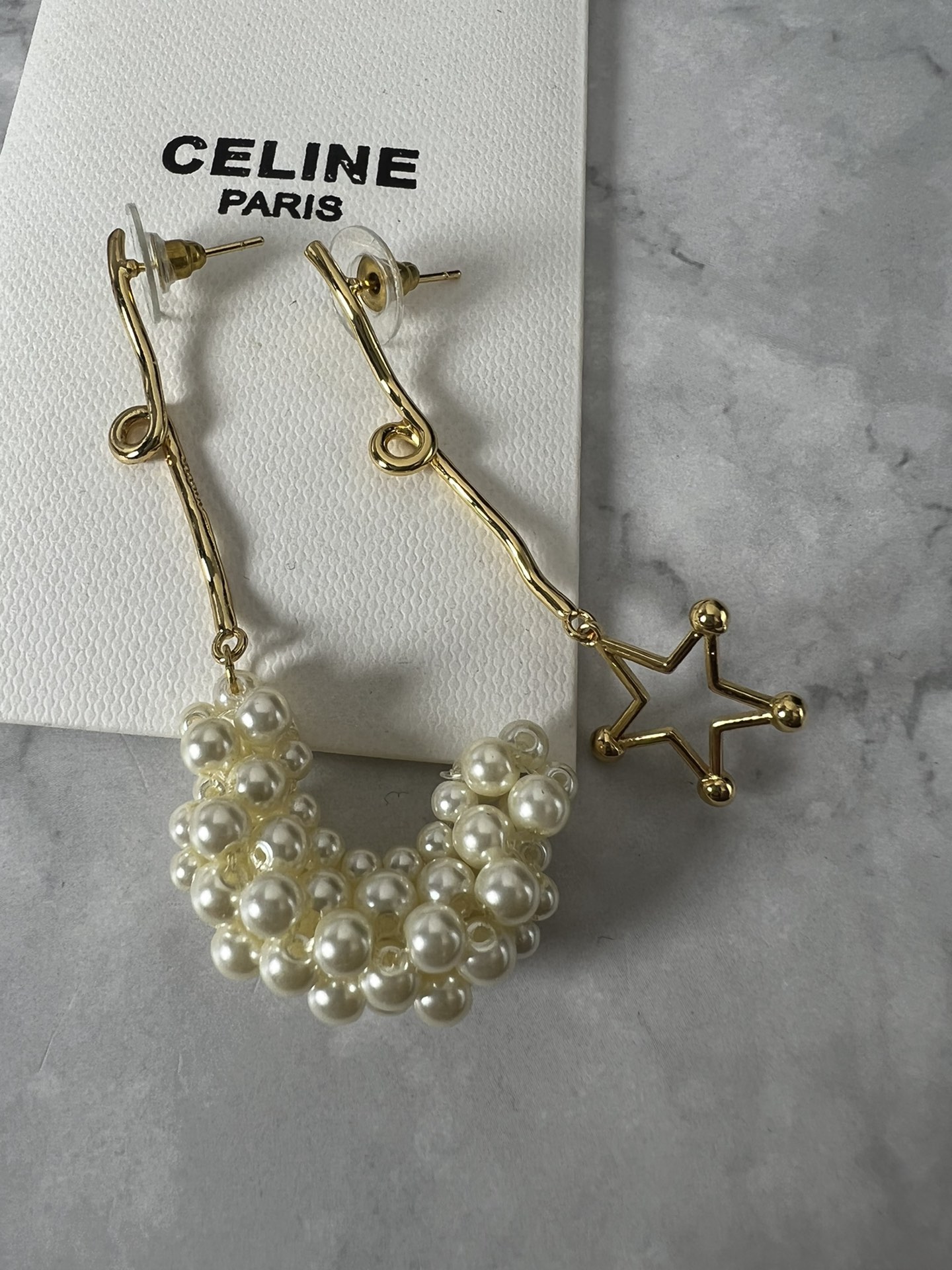 Celine YHED050 Asymmetric Star Pearl Drop earrings gold-tone metal cream white faux pearl 6cm drop length