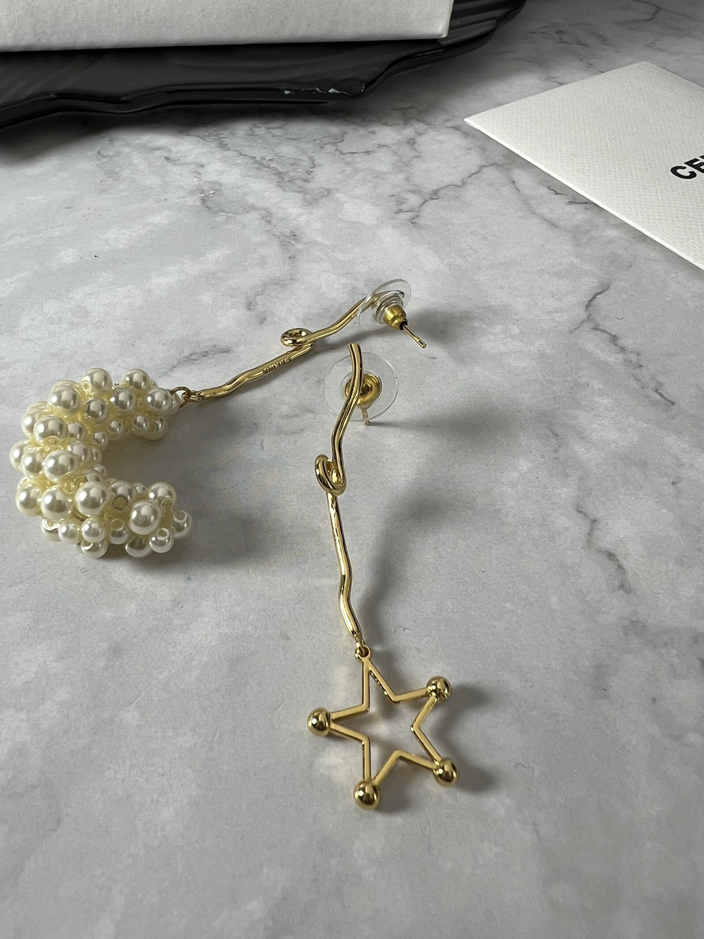 Celine YHED050 Asymmetric Star Pearl Drop earrings gold-tone metal cream white faux pearl 6cm drop length