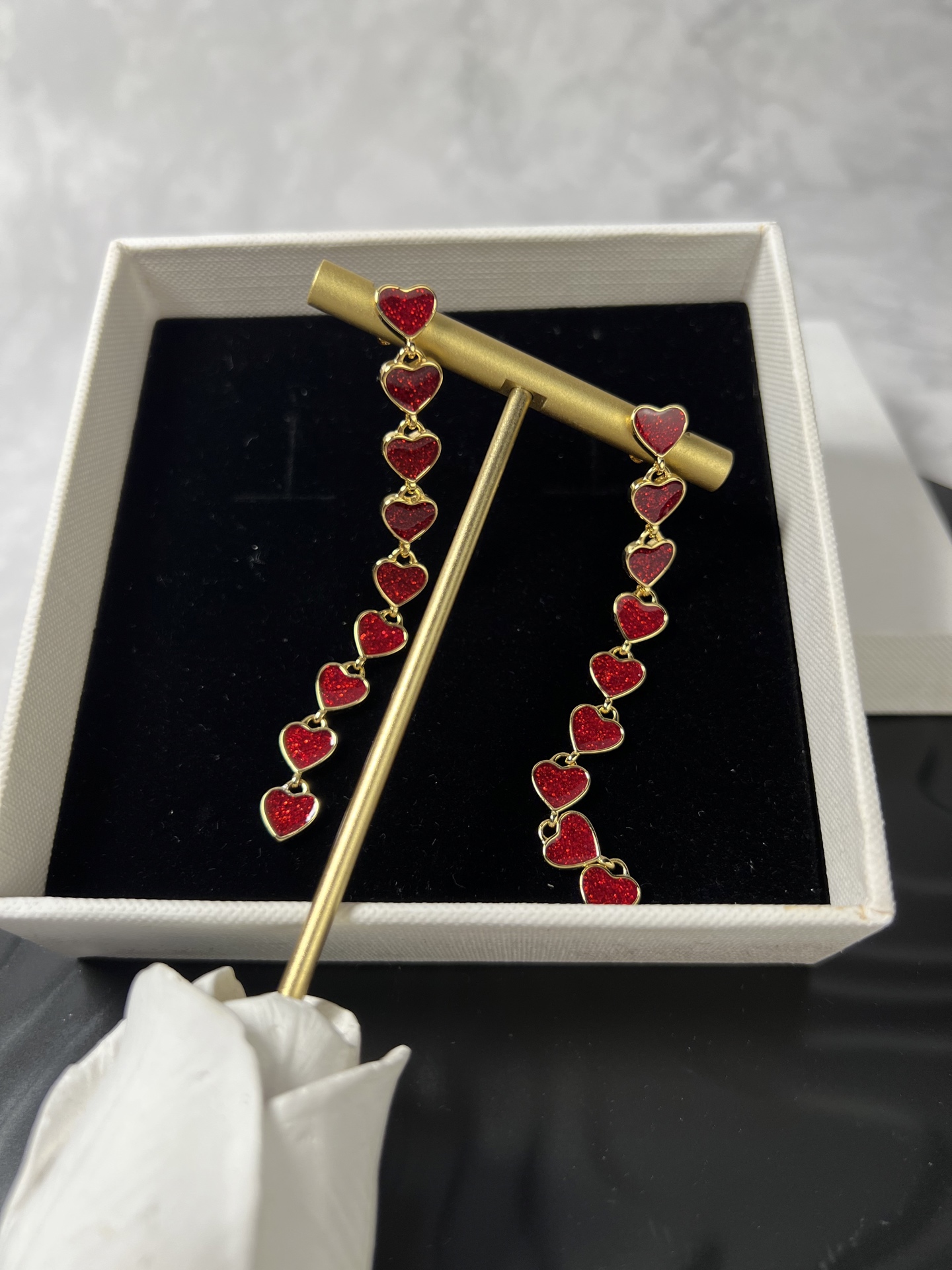 Celine YHED055 Glitter Heart Drop earrings gold-tone metal with glittery deep red enamel heart accents 6 5cm drop length