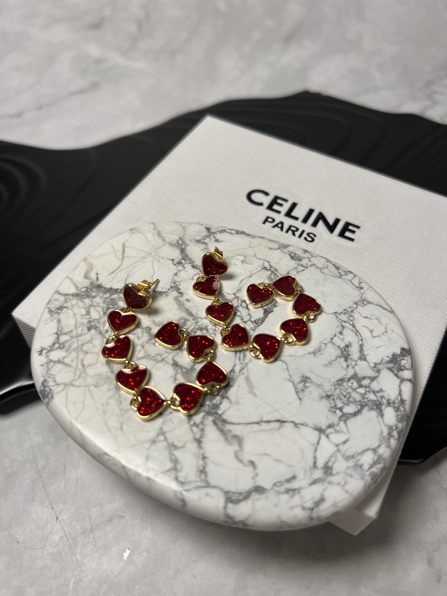 Celine YHED055 Glitter Heart Drop earrings gold-tone metal with glittery deep red enamel heart accents 6 5cm drop length