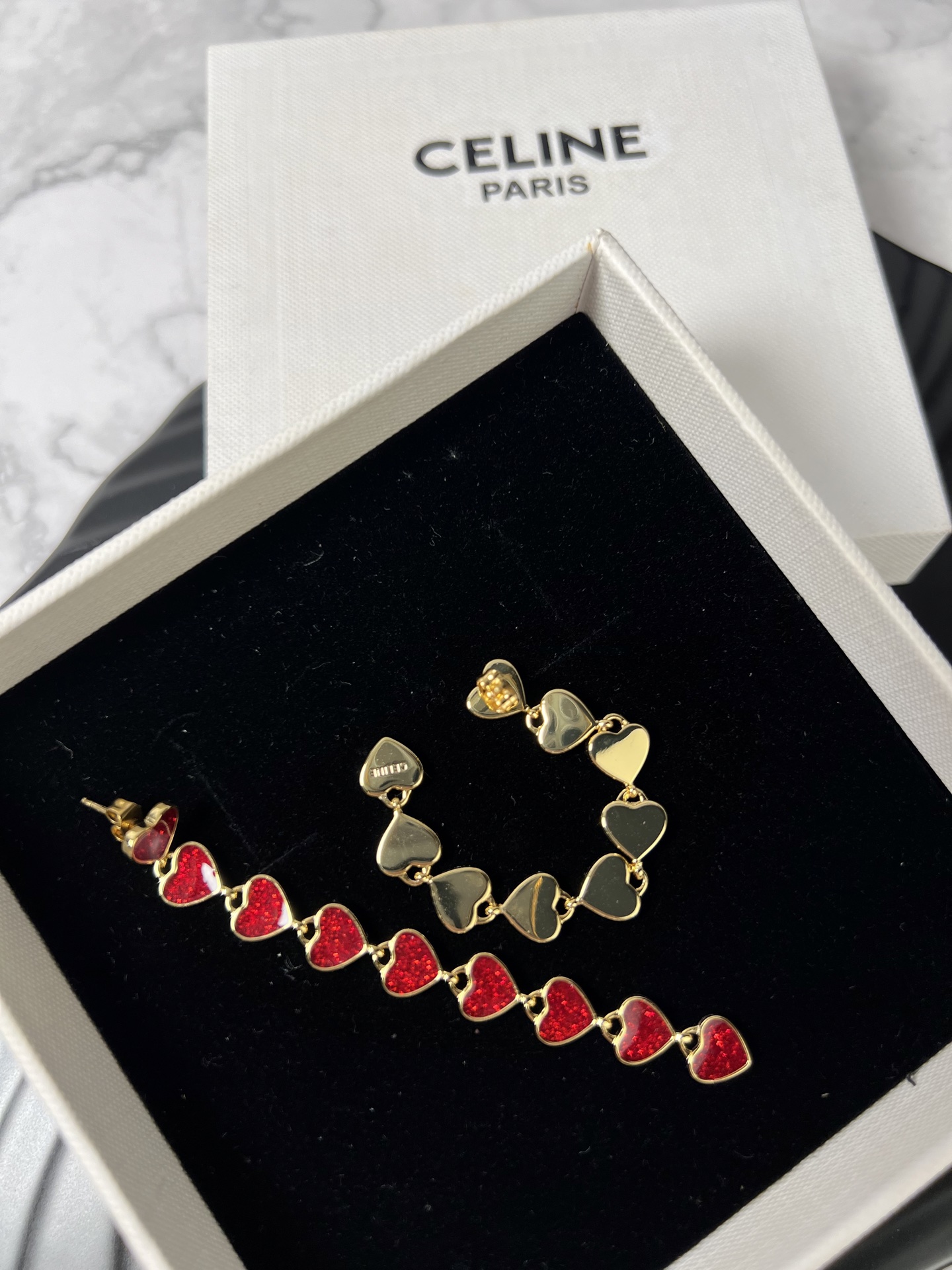 Celine YHED055 Glitter Heart Drop earrings gold-tone metal with glittery deep red enamel heart accents 6 5cm drop length