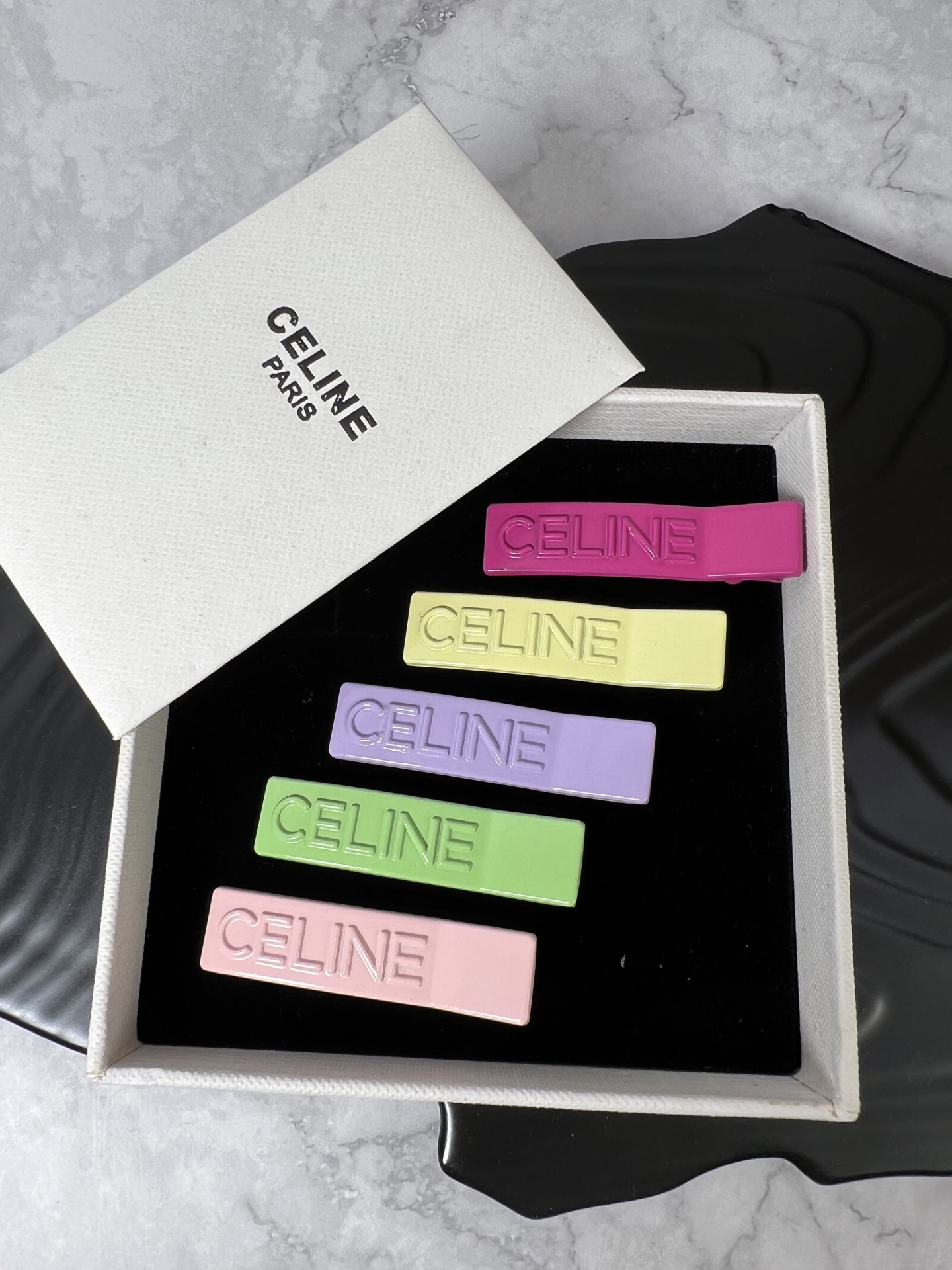 Celine YHFJ045 Embossed Logo Hair Clip Set brooch Enamel in fuchsia light pink light green light purple pale yellow with embossed matching-tone Celine logo 6cm per