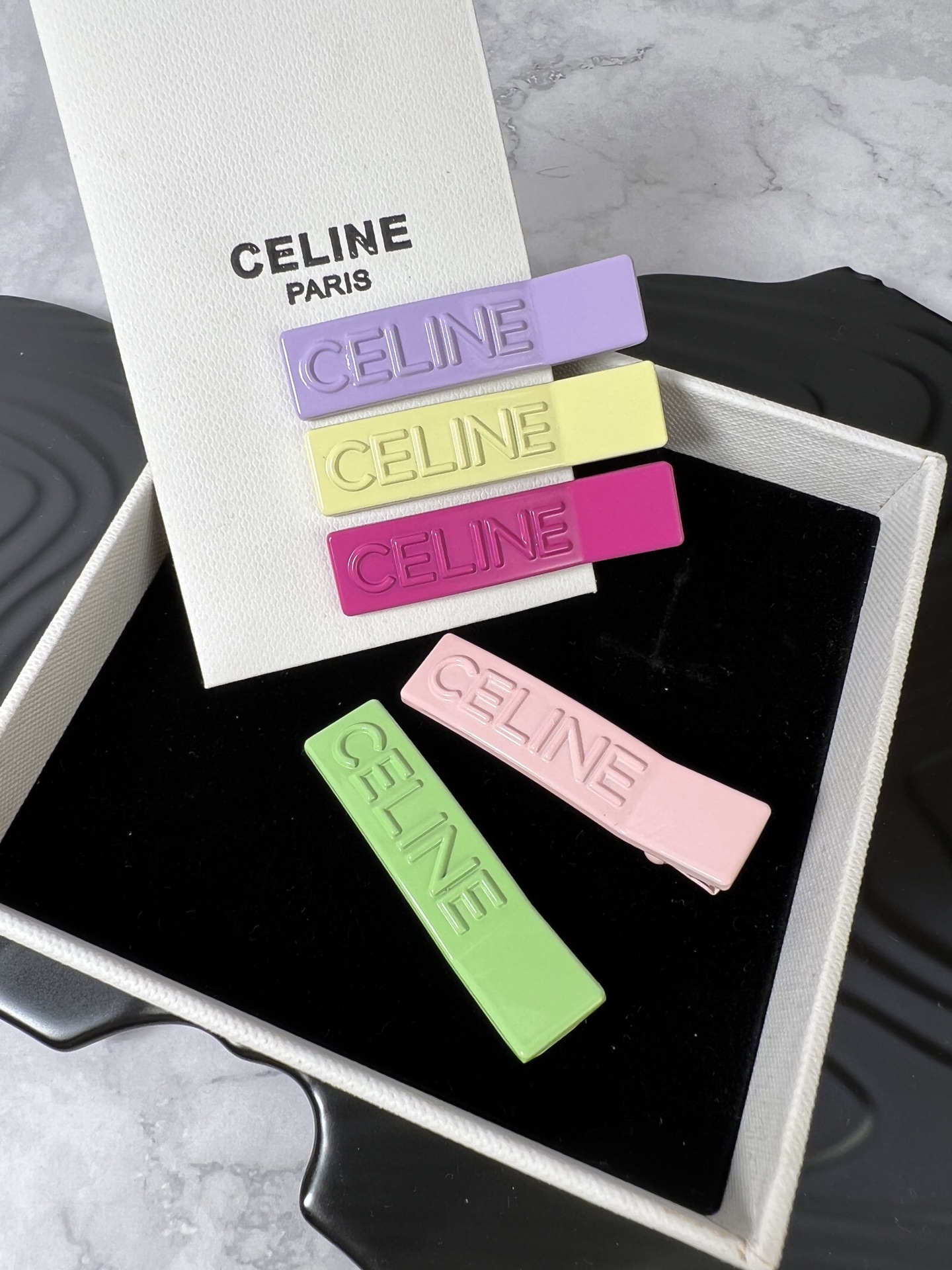 Celine YHFJ045 Embossed Logo Hair Clip Set brooch Enamel in fuchsia light pink light green light purple pale yellow with embossed matching-tone Celine logo 6cm per