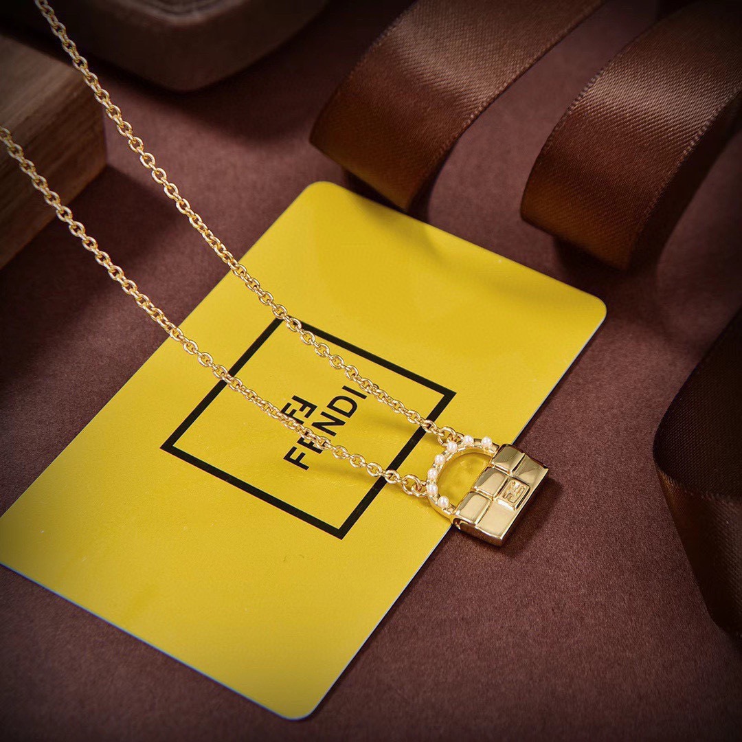 Fendi Baguette Bag Pendant necklace gold-tone metal with white pearl accents 45cm with 5cm extender