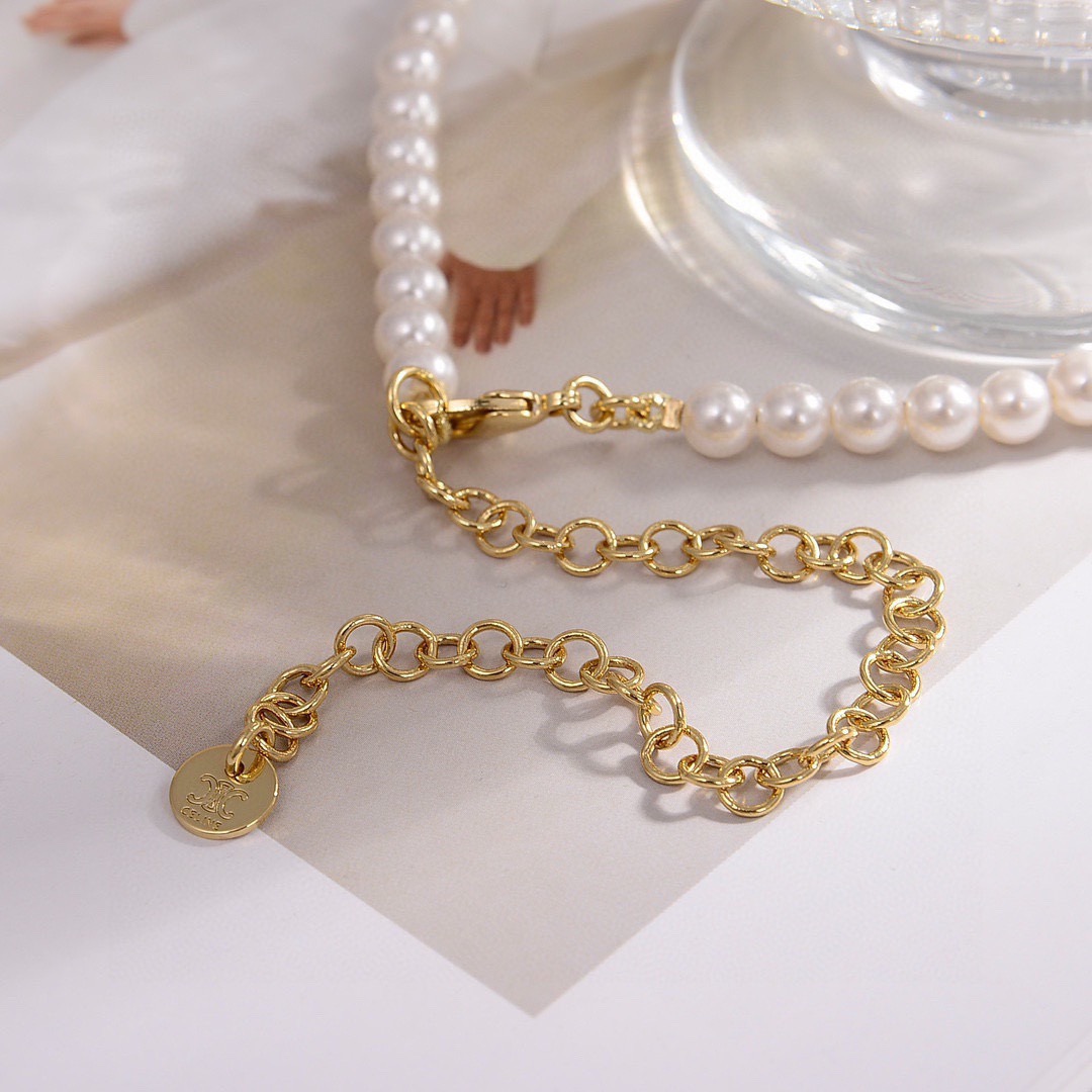 Celine PRECIOUS Heart Pearl bracelet gold-tone metal white pearl clear crystal accents 18cm with 5cm extender chain