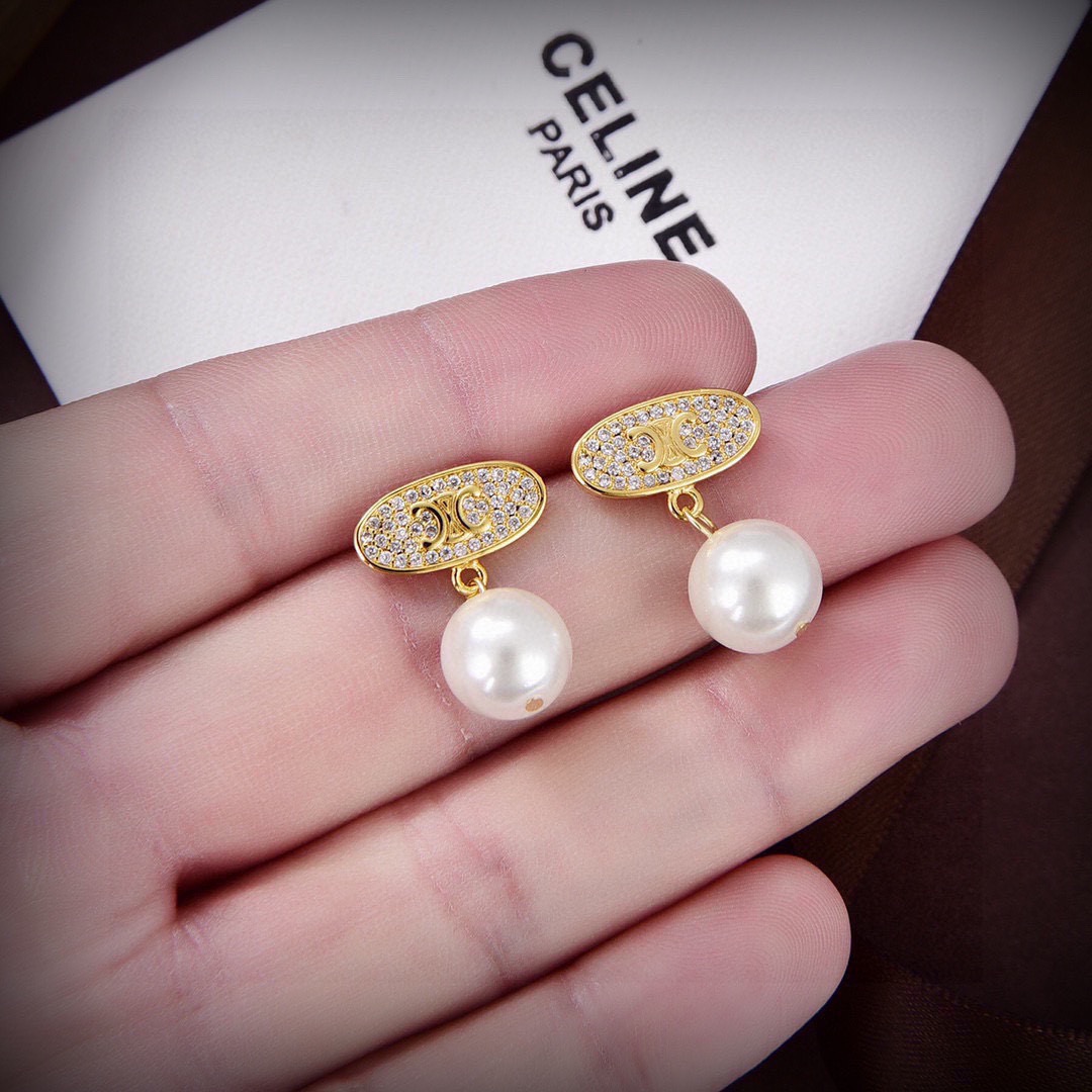 Celine PRECIOUS Triomphe Pearl Drop Earrings earrings Gold-tone metal with clear pave crystals and white freshwater pearls also available in silver-tone metal with clear pave crystals and white freshwater pearls 1 5cm drop length