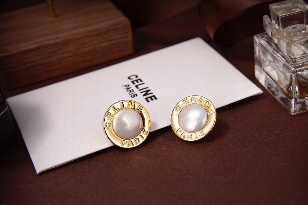 Celine Celine Paris Pearl Logo Stud Earrings earrings gold-tone metal with white pearl center 1 5cm diameter