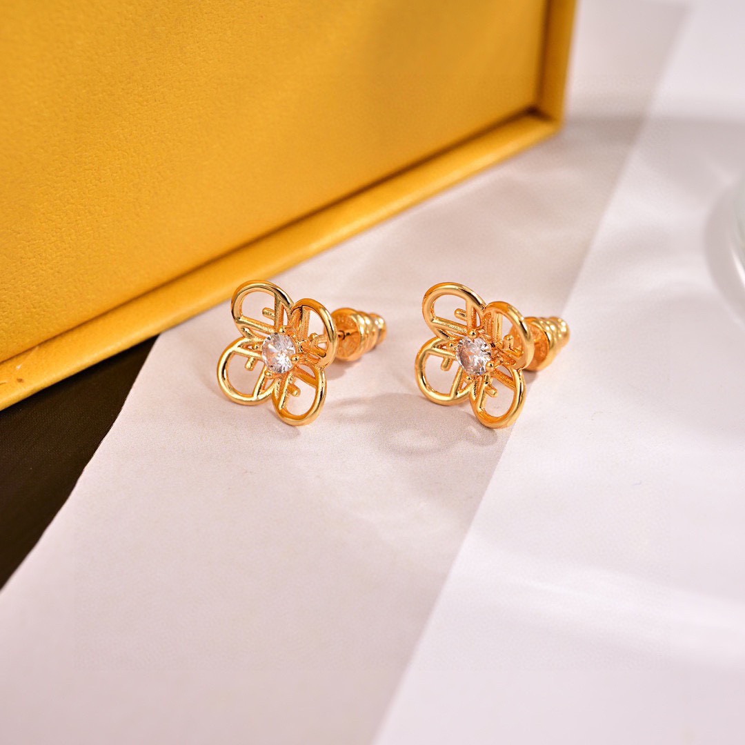 Fendi FF Logo Flower Stud Earrings earrings gold-tone metal with clear cubic zirconia center stone 1cm stud diameter