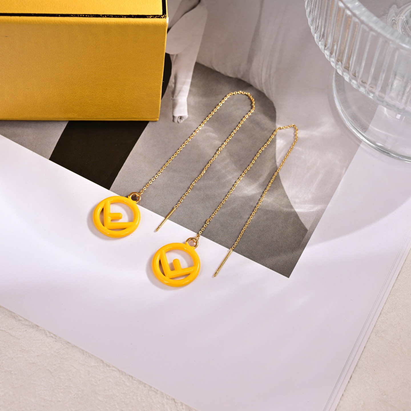 Fendi F is Fendi Logo Threader Earrings earrings Gold-tone metal with pink enamel first pair gold-tone metal with yellow enamel third pair additional colorways include white navy blue red enamel 10cm chain length