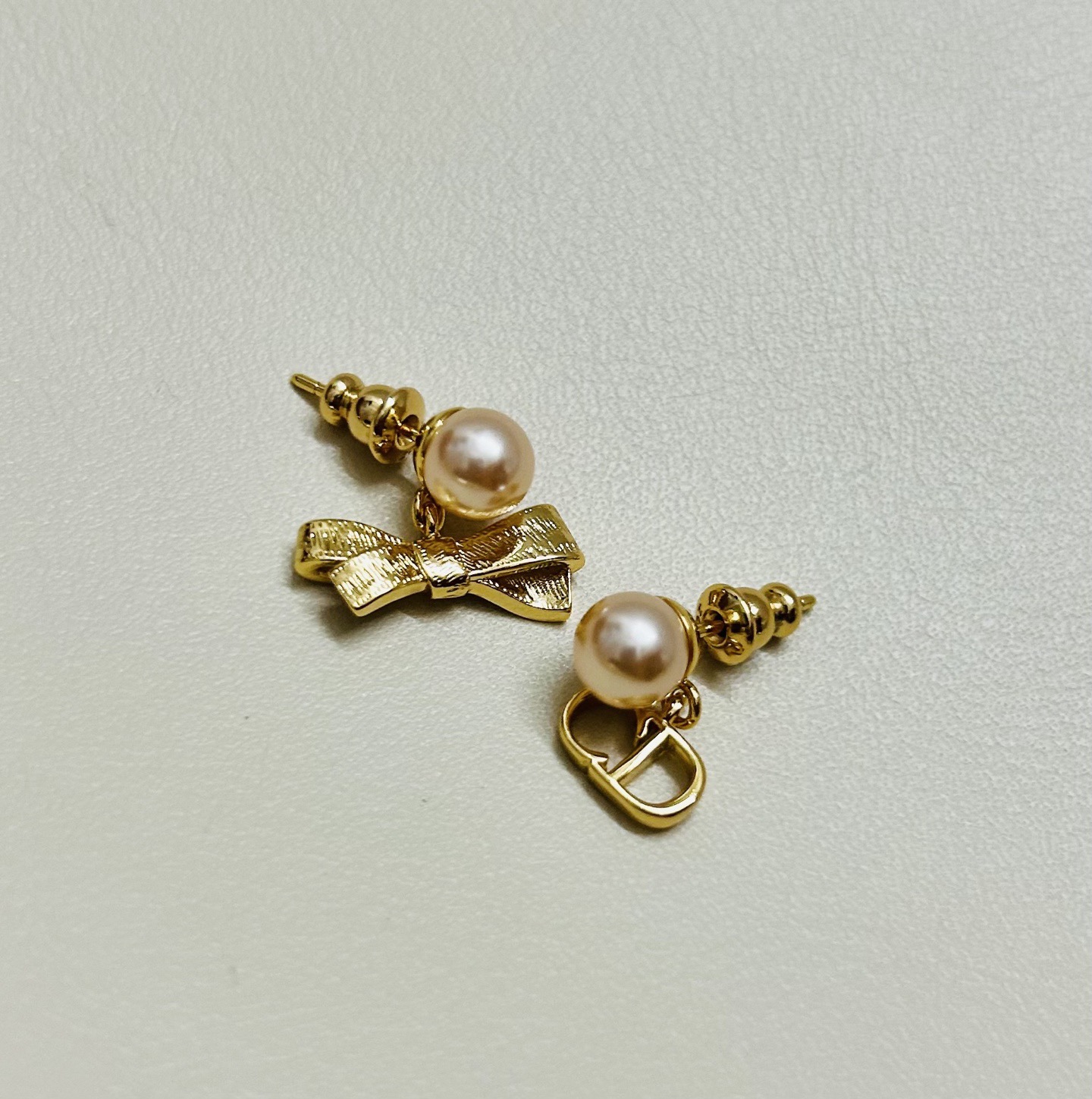 Dior CD Bow earrings Gold-tone metal with champagne pink pearl resin beads One Size