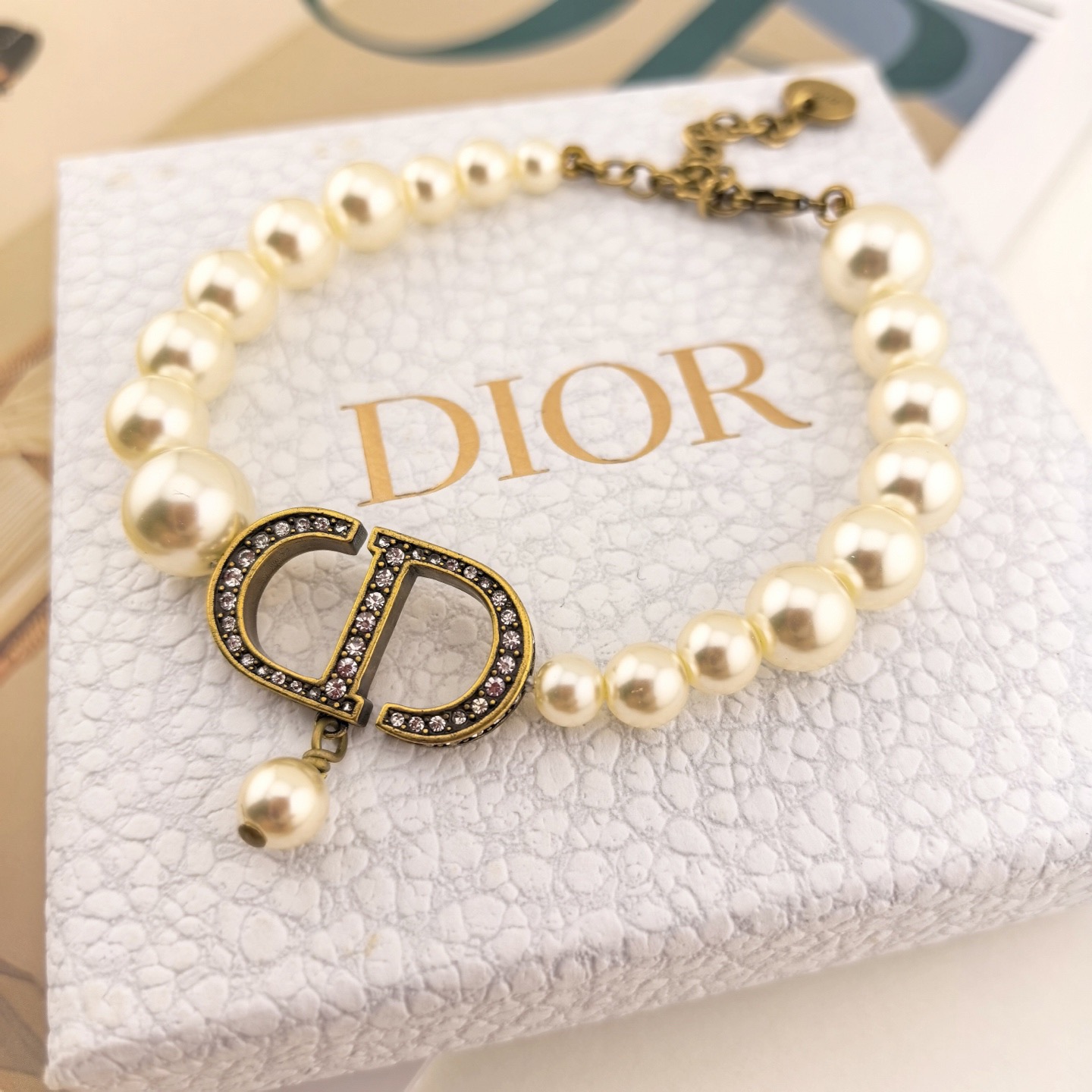 Dior 30 Montaigne CD Pearl Bracelet bracelet antique gold metal white resin pearls clear crystal accents 17cm with 3cm extender chain