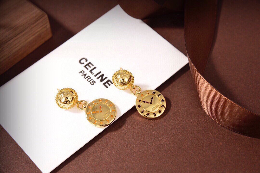 Celine Celestial Clock Drop Earrings earrings gold-tone metal with black and orange enamel star and moon detailing 2 5cm drop length