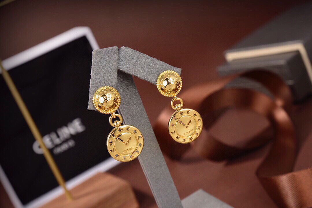 Celine Celestial Clock Drop Earrings earrings gold-tone metal with black and orange enamel star and moon detailing 2 5cm drop length