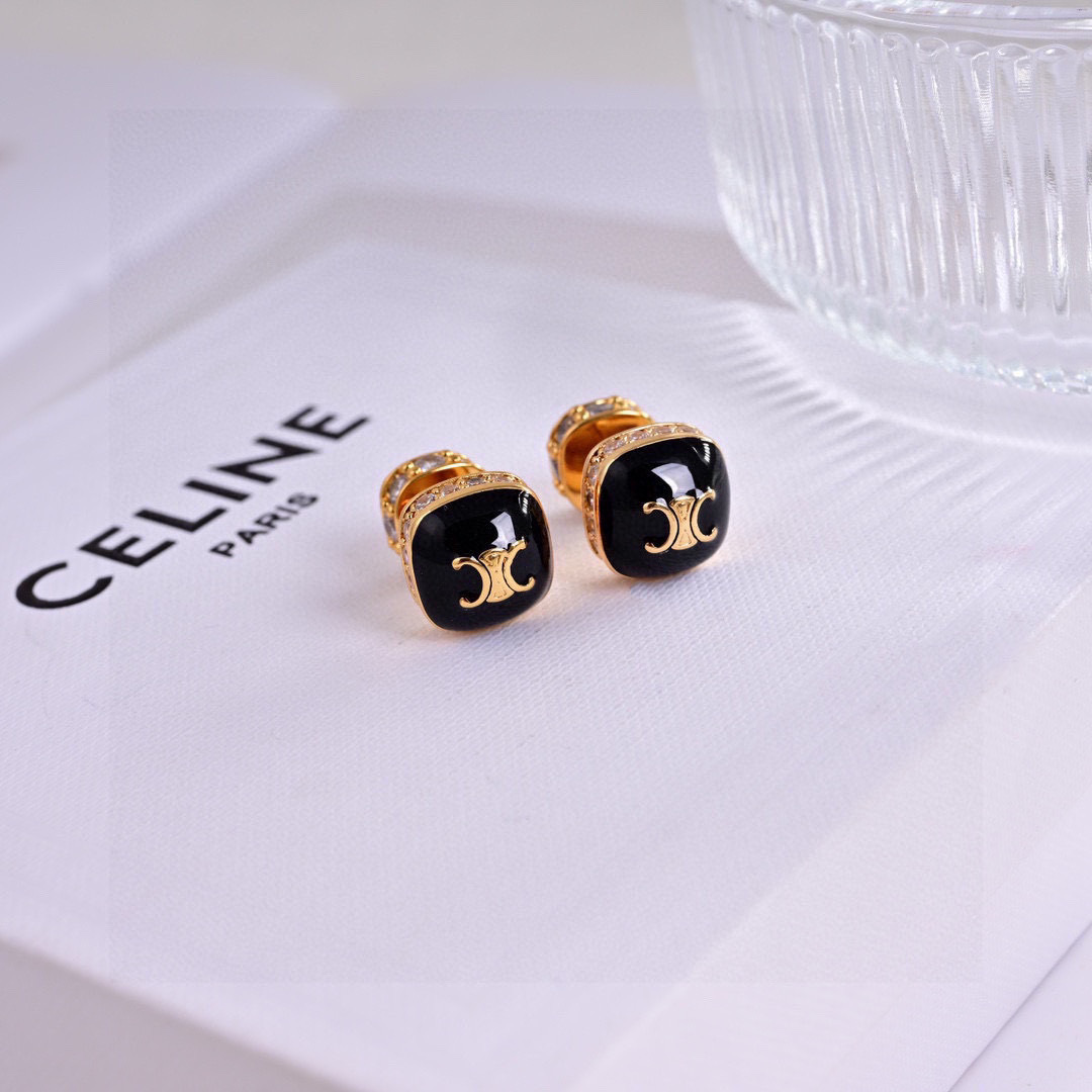 Celine Triomphe Square Stud Earrings earrings Gold-tone metal with clear cubic zirconia accents available in black enamel and white mother-of-pearl face options with gold Triomphe logo 1cm stud diameter