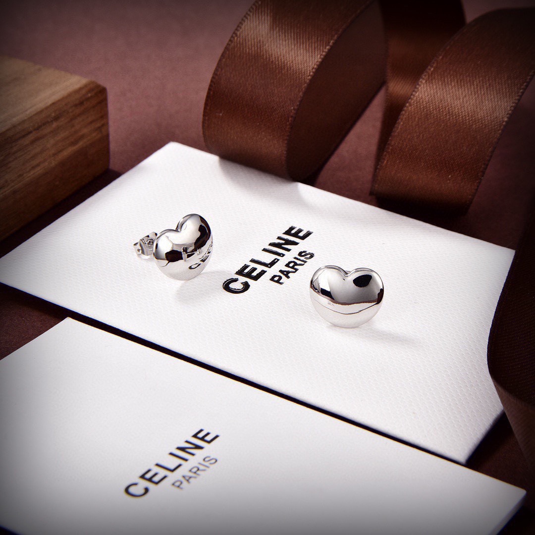 Celine Puffed Heart Stud Earrings earrings Gold-tone metal also available in silver-tone metal polished finish no gemstones 10mm diameter