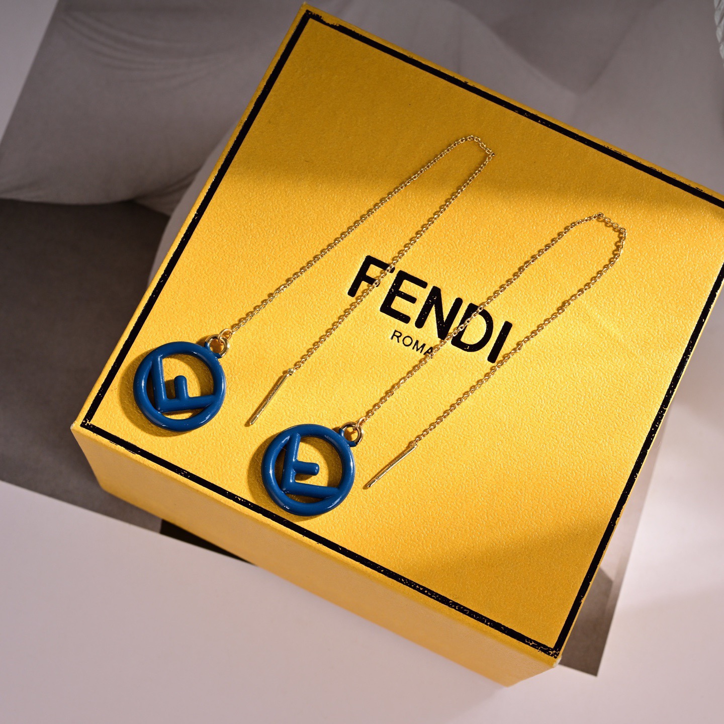 Fendi F is Fendi Logo Threader Earrings earrings Gold-tone metal with pastel pink enamel first variant gold-tone metal with multi-color enamel white navy red pink yellow second variant gold-tone metal with bright yellow enamel third variant 10cm chain length
