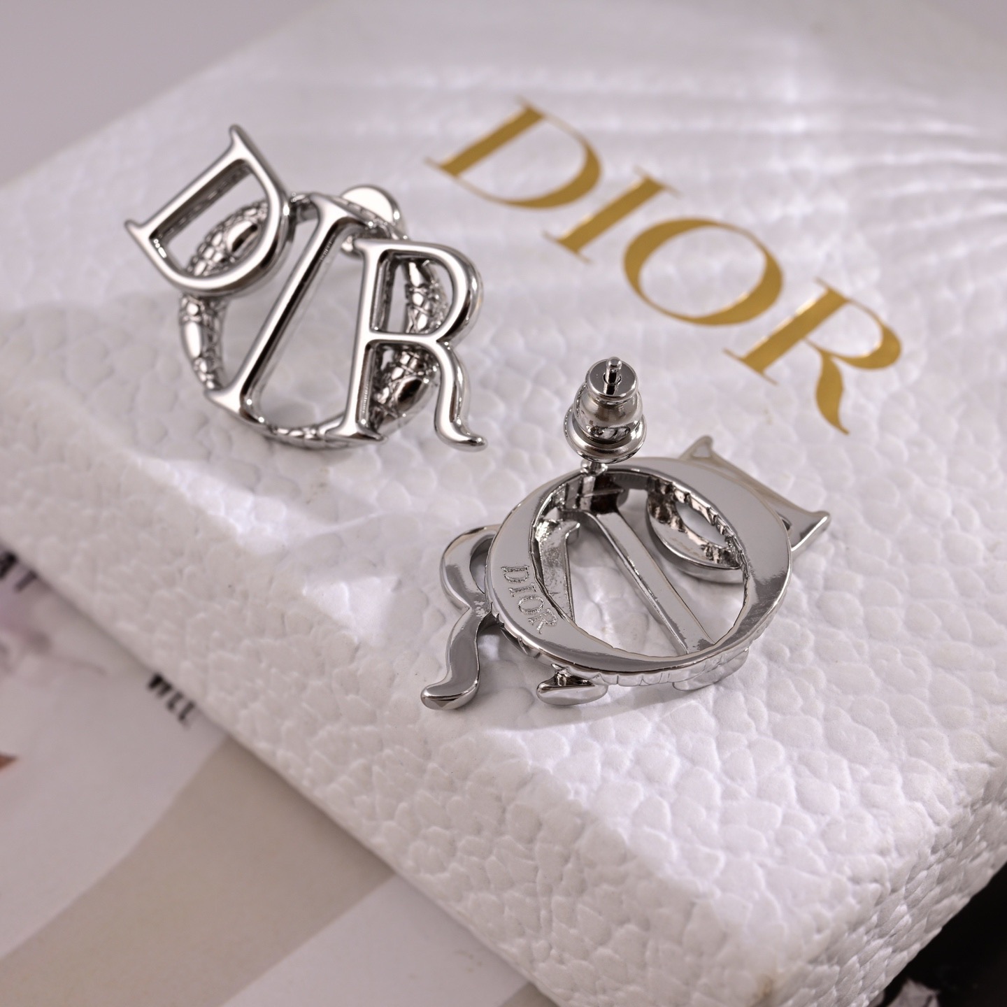 Dior Dio r evolution Logo Stud Earrings earrings silver-toned metal with textured silver detailing 1 5cm diameter