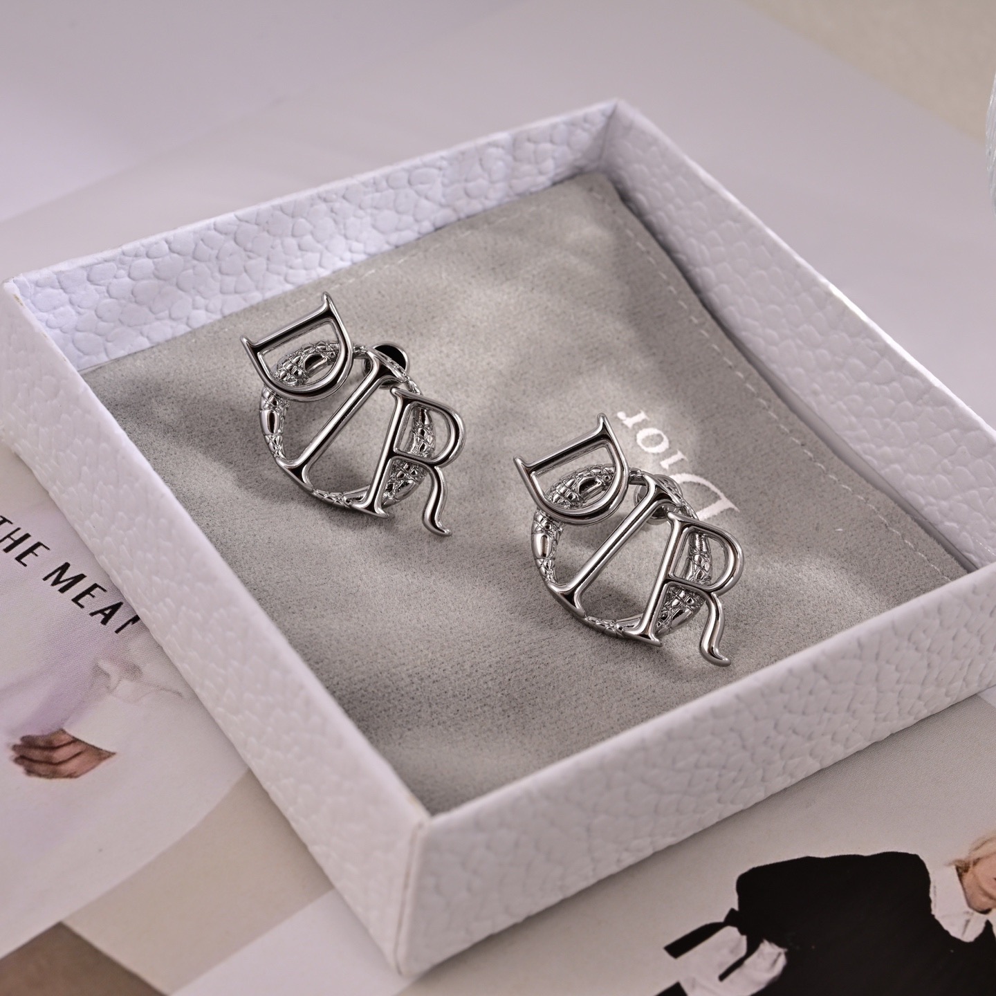 Dior Dio r evolution Logo Stud Earrings earrings silver-toned metal with textured silver detailing 1 5cm diameter