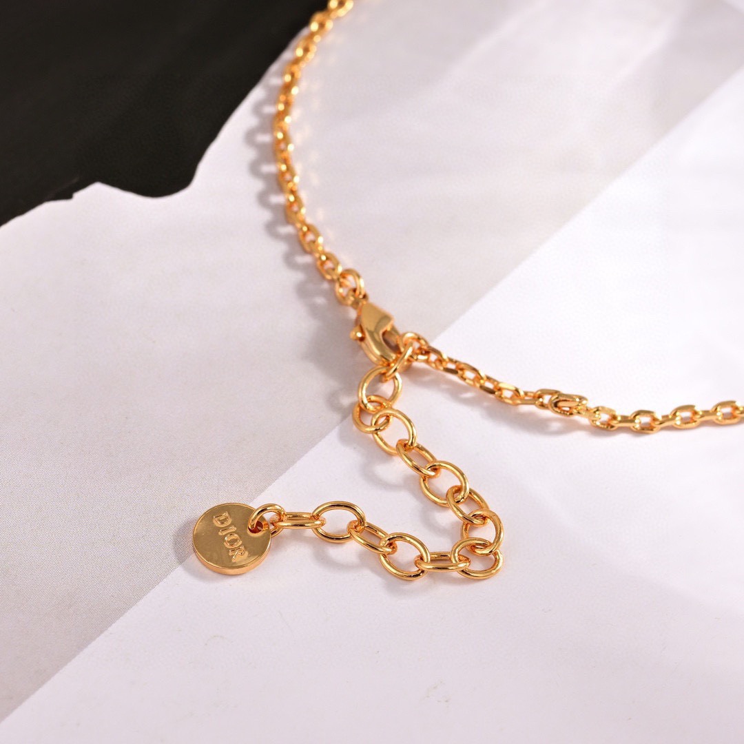 Dior Christian Dior Paris Circle Pendant necklace Gold-tone metal white enamel clear crystal stones 42cm with 5cm extender chain