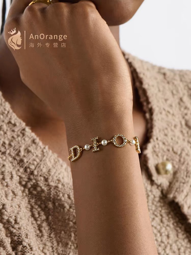 Dior Dio r evolution bracelet gold-tone metal clear crystal white faux pearl 17cm