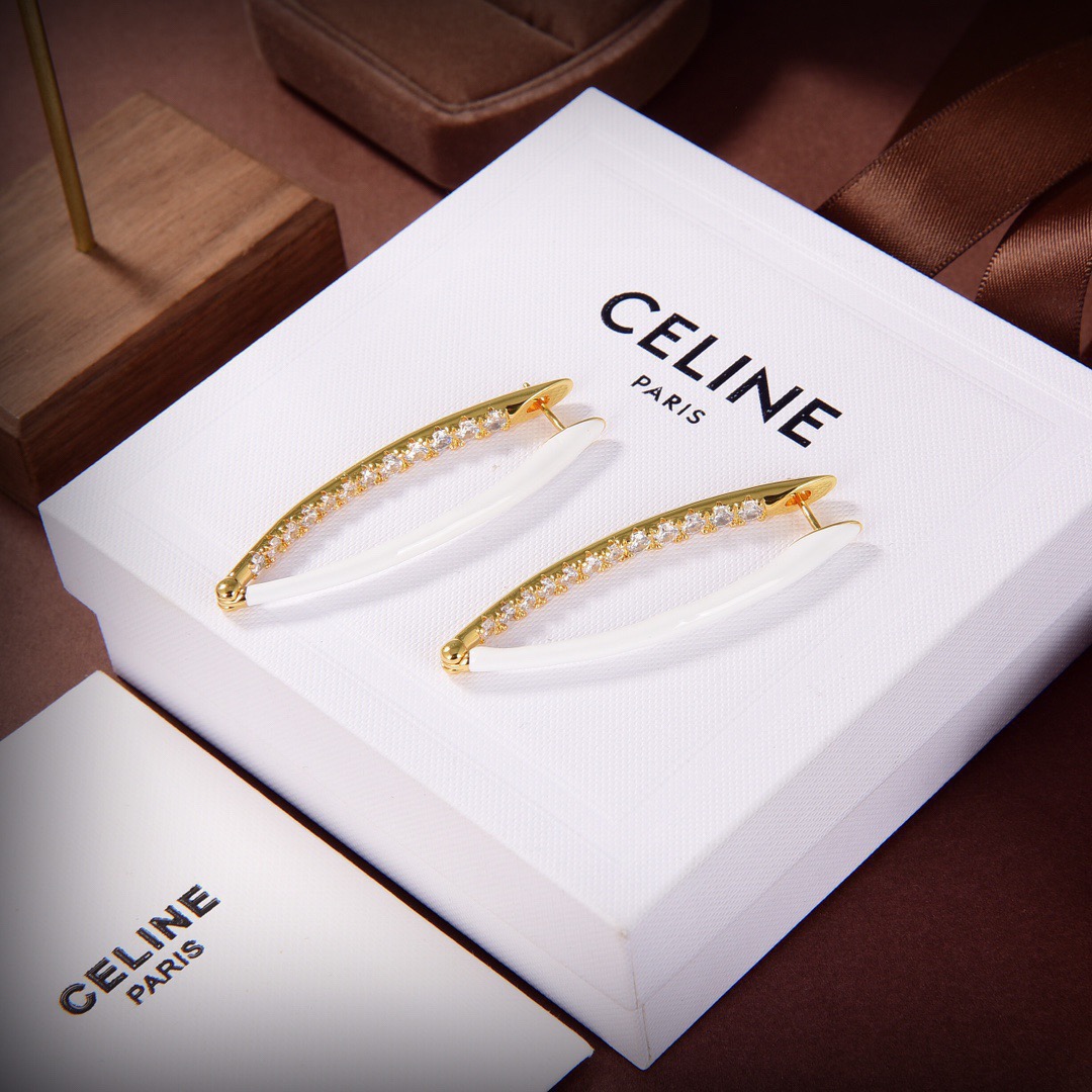 Celine PRECLOUS earrings 18k gold tone metal with clear crystals available in white enamel and pink enamel variants 5cm length