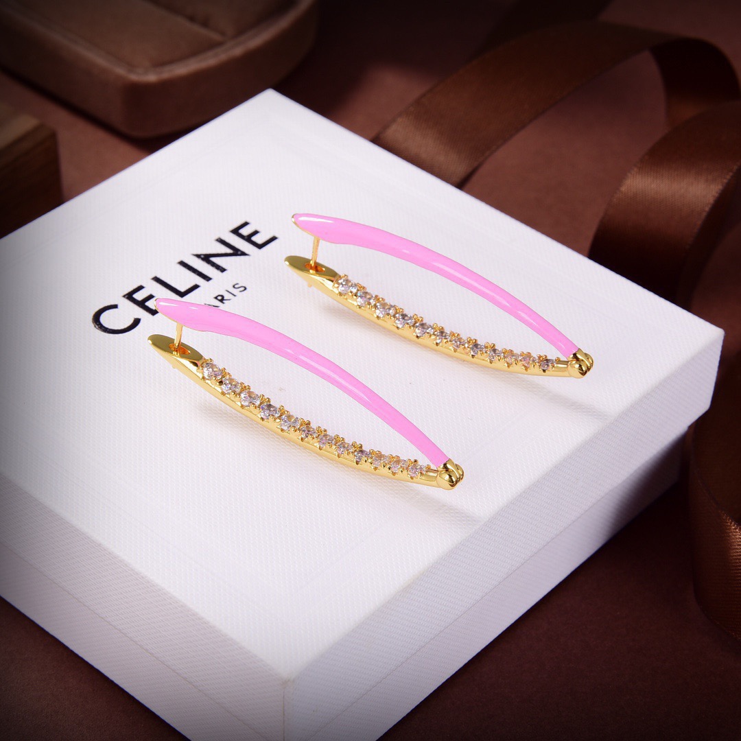 Celine PRECLOUS earrings 18k gold tone metal with clear crystals available in white enamel and pink enamel variants 5cm length